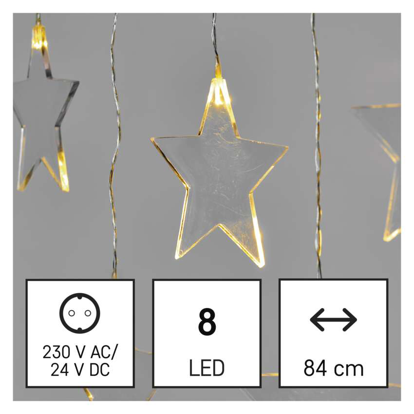 Átlátszó csillag alakú lámpák szürke háttér előtt. Infoboxok feszültséget, 8 LED-et és 84 cm-es hosszúságot mutatnak.