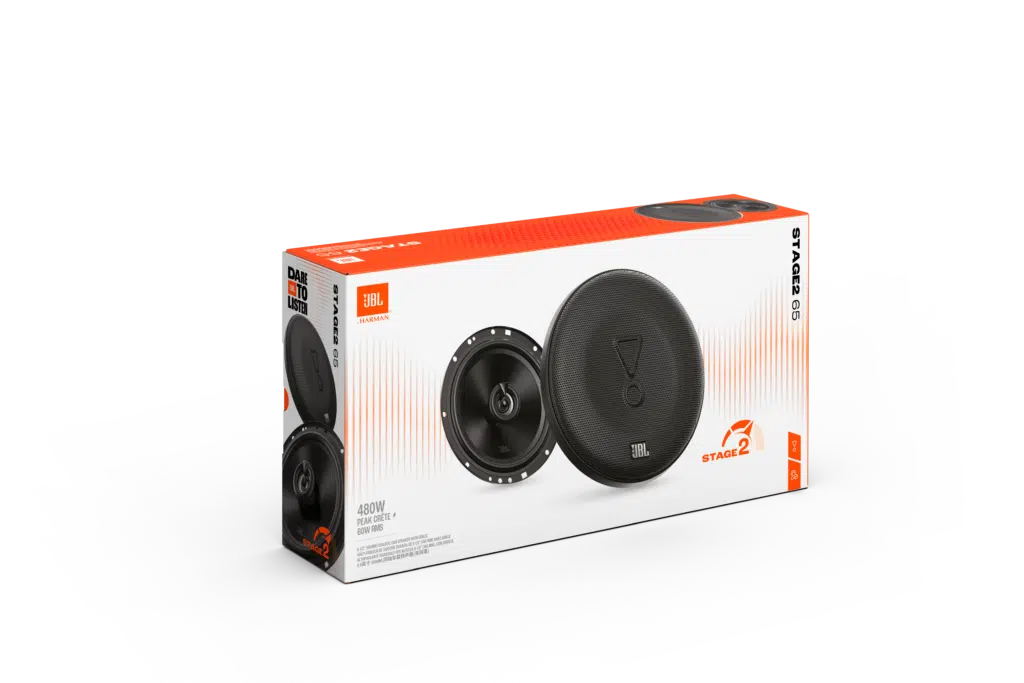 Egy fehér és narancssárga doboz JBL hangszórókkal. Két fekete hangszóró látható. A dobozon a JBL logó és termékinformációk találhatók.