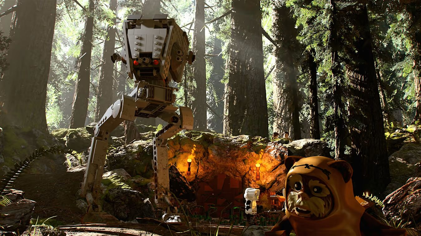 Scena Lego Star Wars: AT-ST w lesie, Ewok, jaskinia z pochodniami. Drzewa w tle. Figurki Lego.
