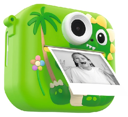 Zielony aparat dinozaura drukujący zdjęcie dziewczynki. Aparat ma wzór palmy i kwiatu. Zdjęcie przedstawia dziewczynkę robiącą znak pokoju.