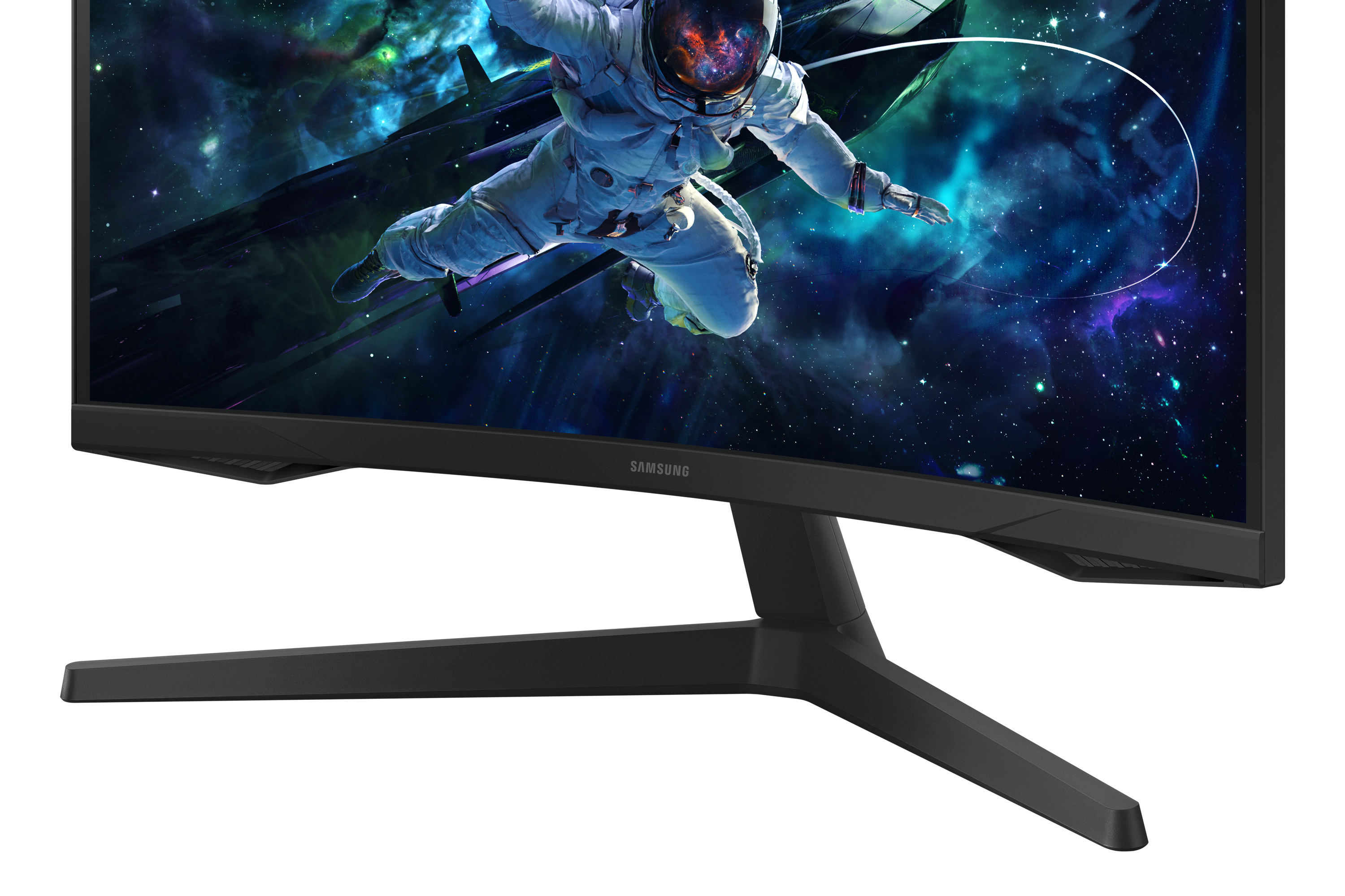 Astronauta w kosmosie na monitorze. Widoczne logo Samsung. Czarny stojak monitora.