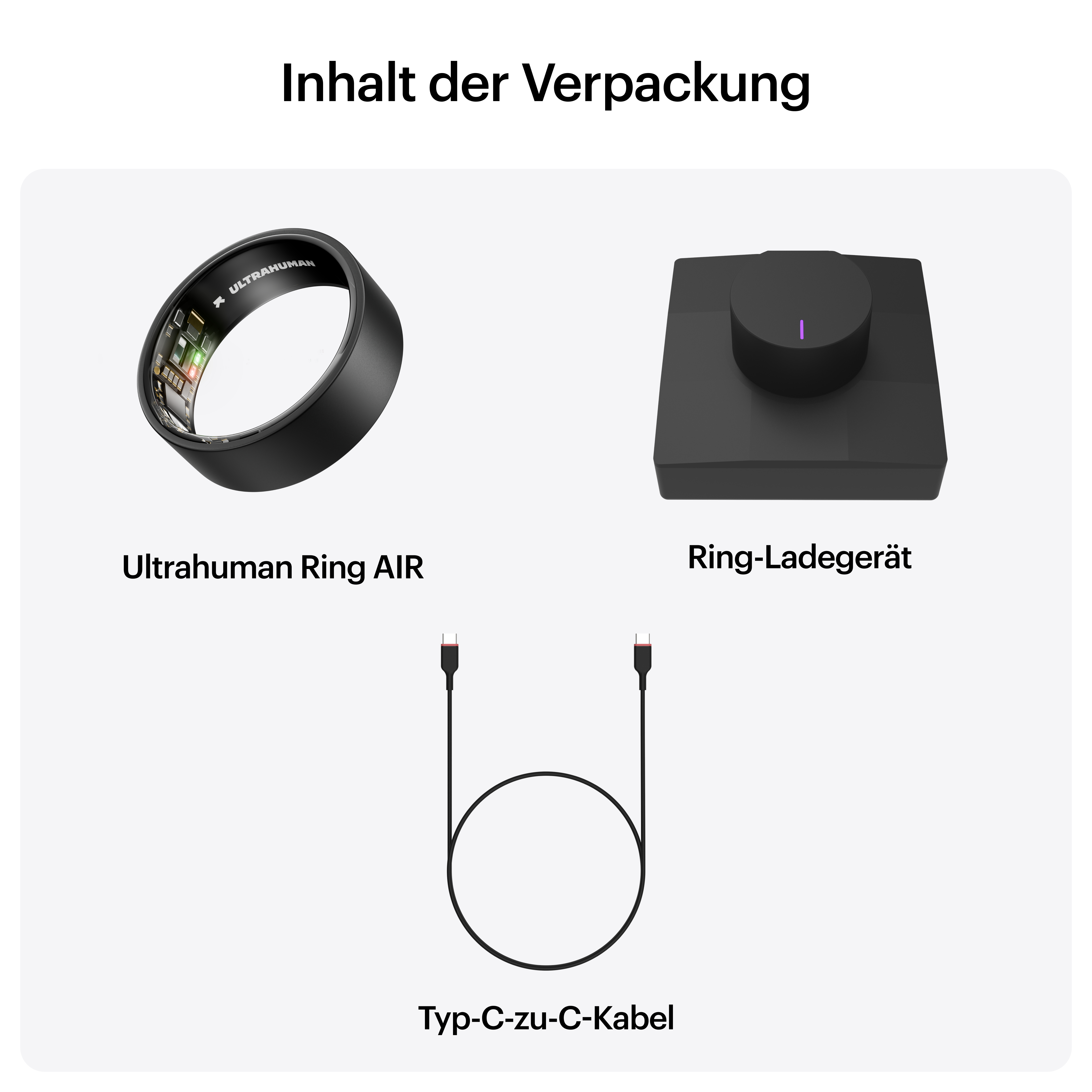 Das Bild zeigt einen Ultrahuman Ring AIR, ein Ladegerät und ein USB-C-Kabel auf weißem Hintergrund.