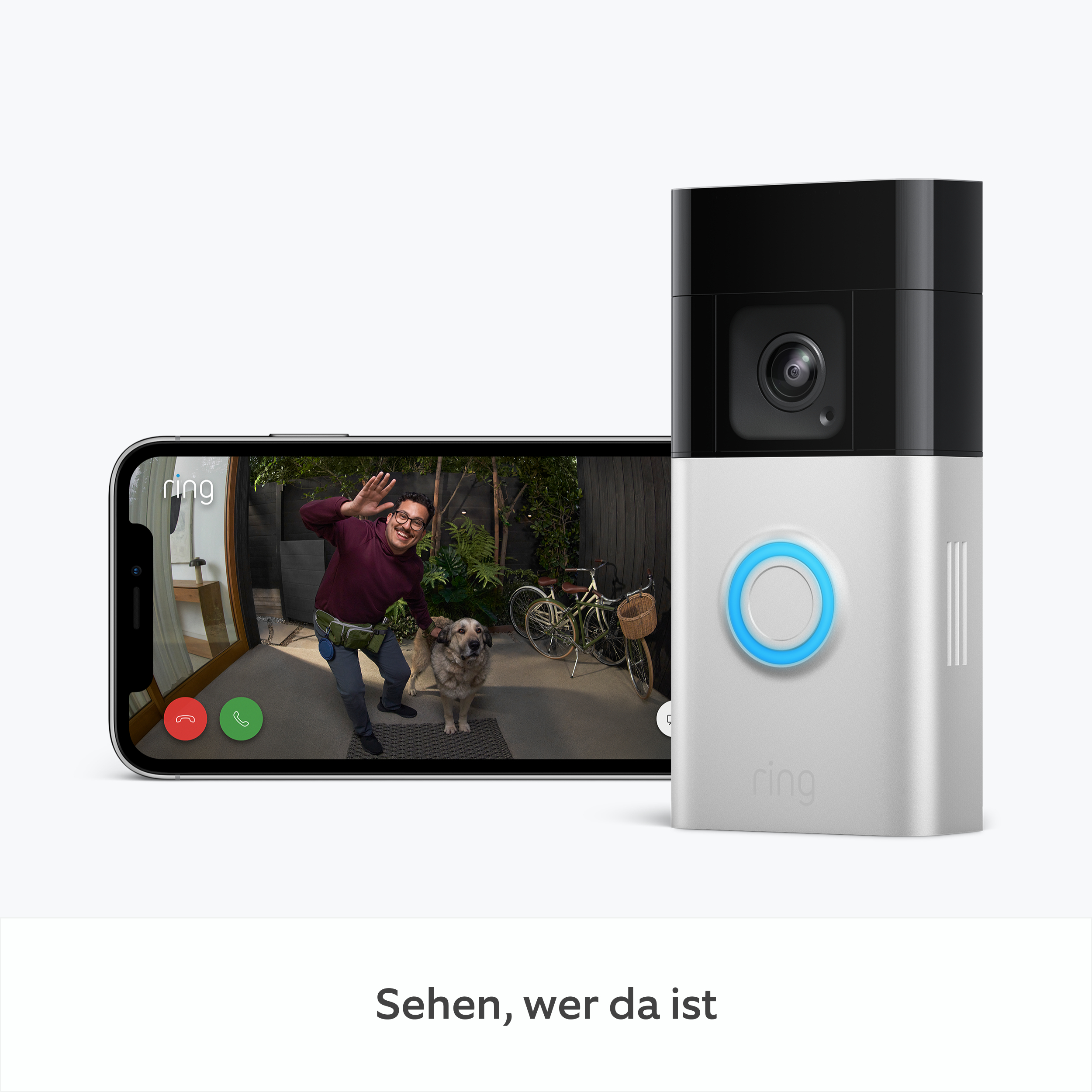 Ring-Türklingel mit Live-Ansicht auf einem Telefon, das eine winkende Person mit einem Hund zeigt.