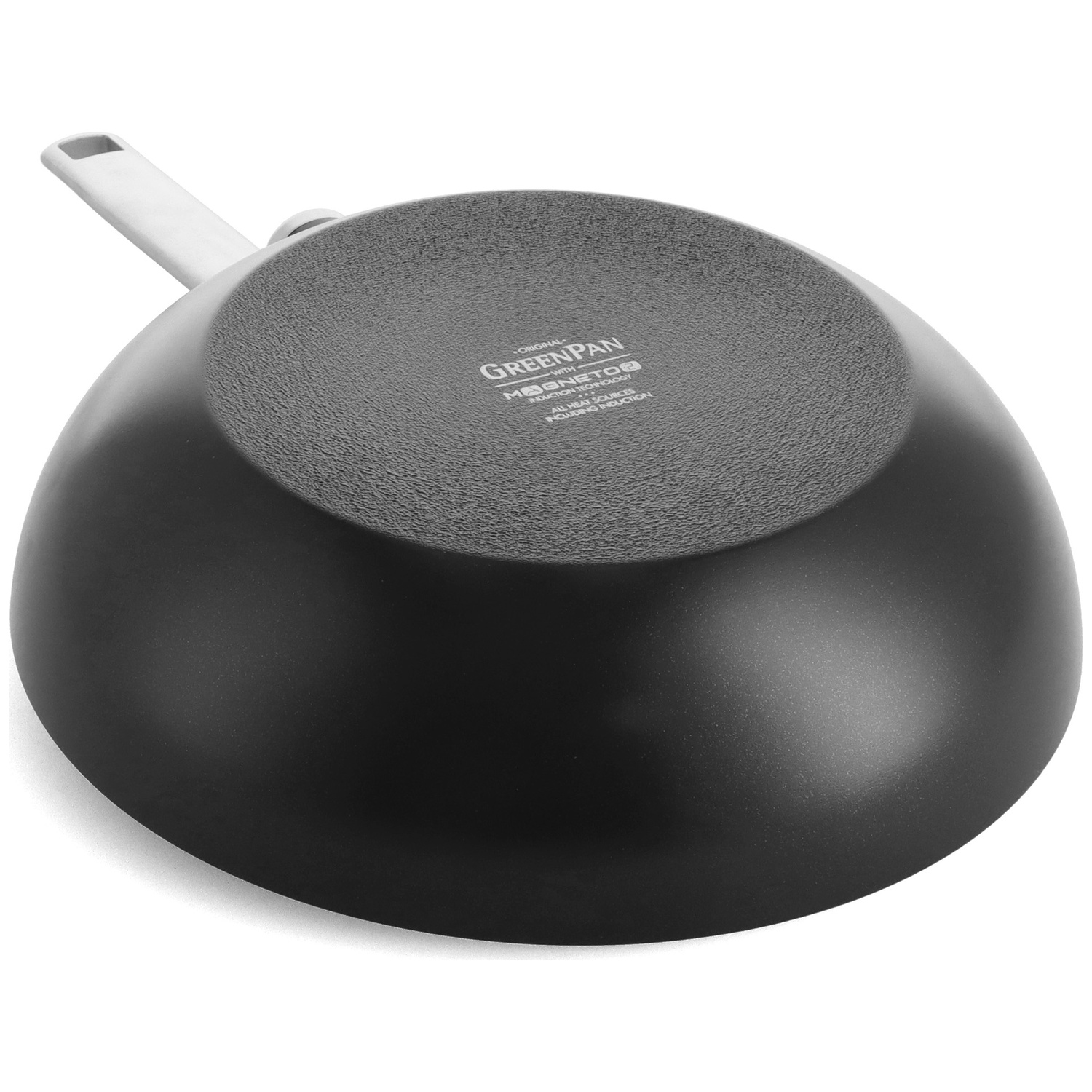 A black GreenPan wok, with a white handle, is shown. The bottom of the wok has a textured surface with the brand name printed on it.