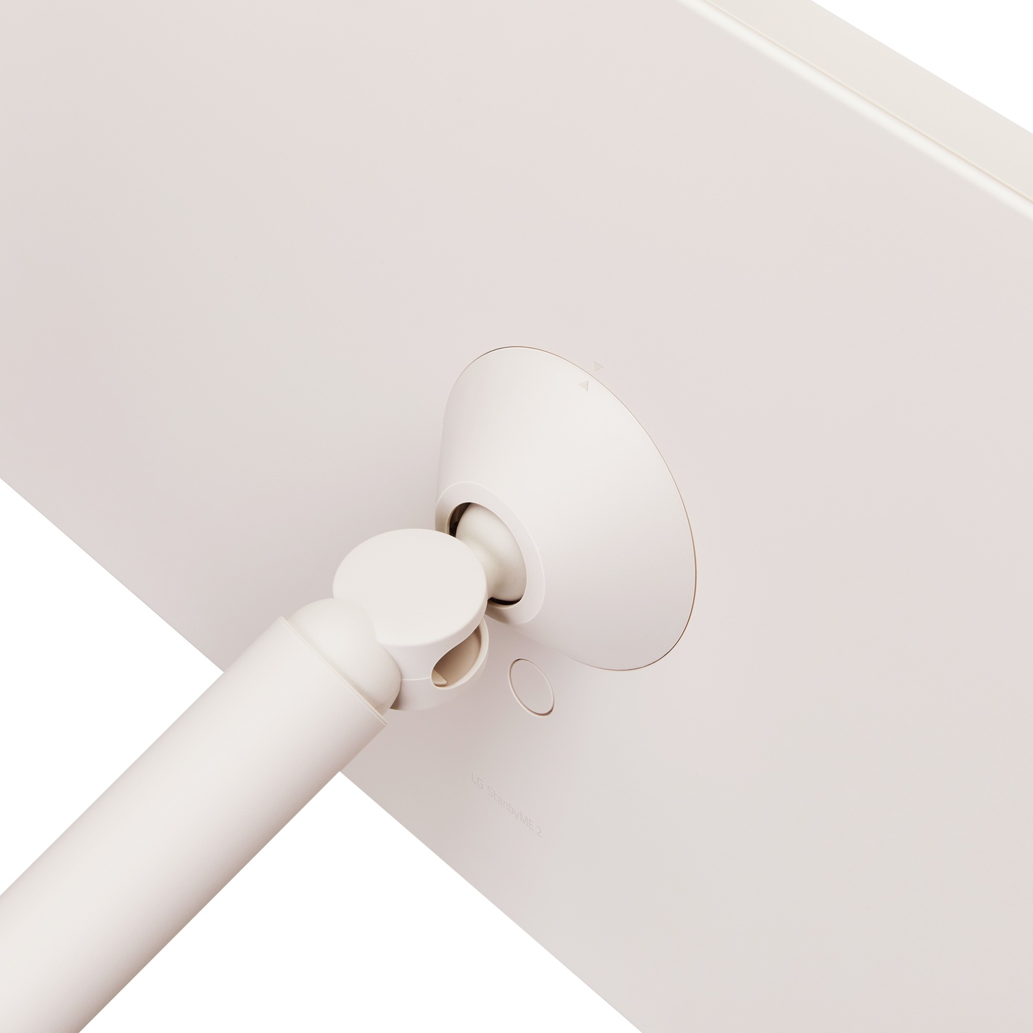 Close-up of a white computer monitor back. It shows the stand attachment, with a curved arm and a round base. The monitor is white.