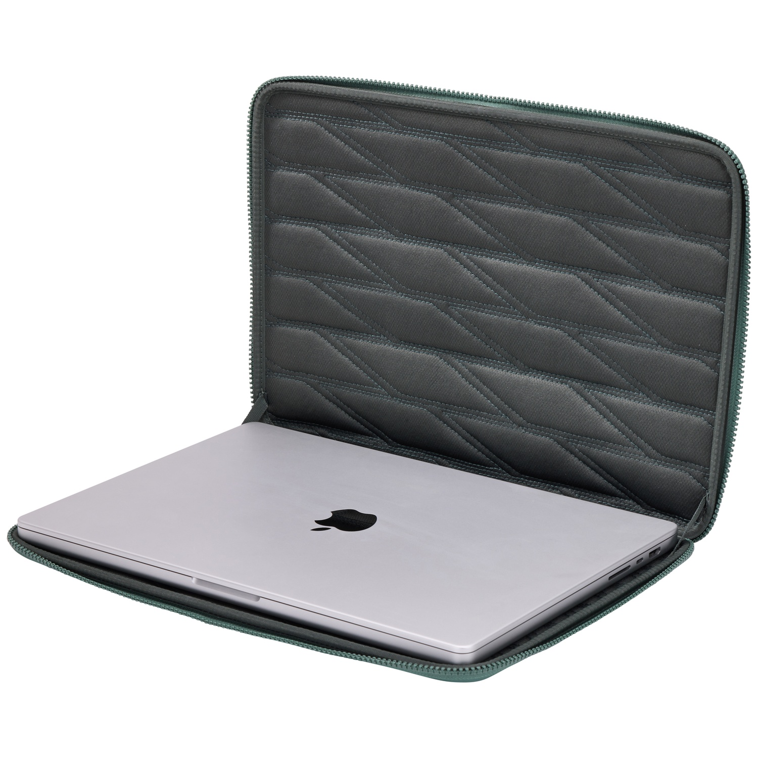 A silver laptop with the Apple logo is inside a green quilted laptop case. The case has a zipper.