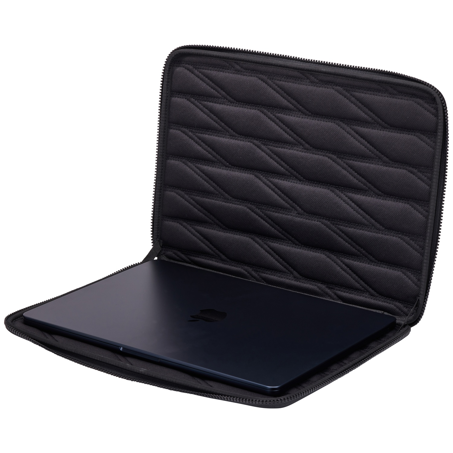 A dark blue laptop inside a black quilted laptop sleeve, open. The background is white.