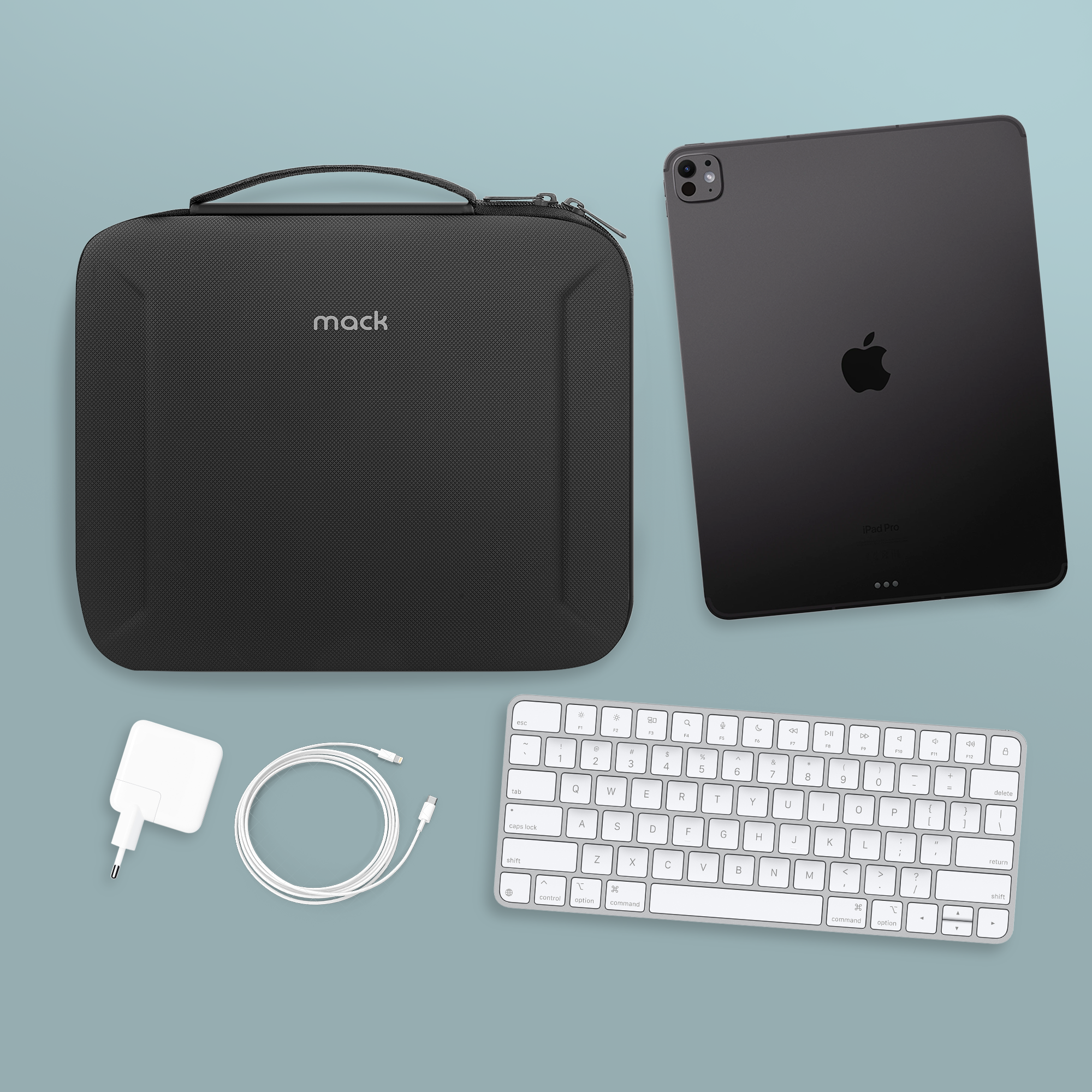 Siyah kılıf, iPad Pro, klavye, şarj cihazı ve kablo mavi-yeşil arka planda. Yukarıdan görünüm.