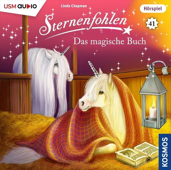 Buchcover mit zwei Einhörnern. Eines liegt unter einer Decke. Eine Laterne und ein offenes Buch sind ebenfalls zu sehen.
