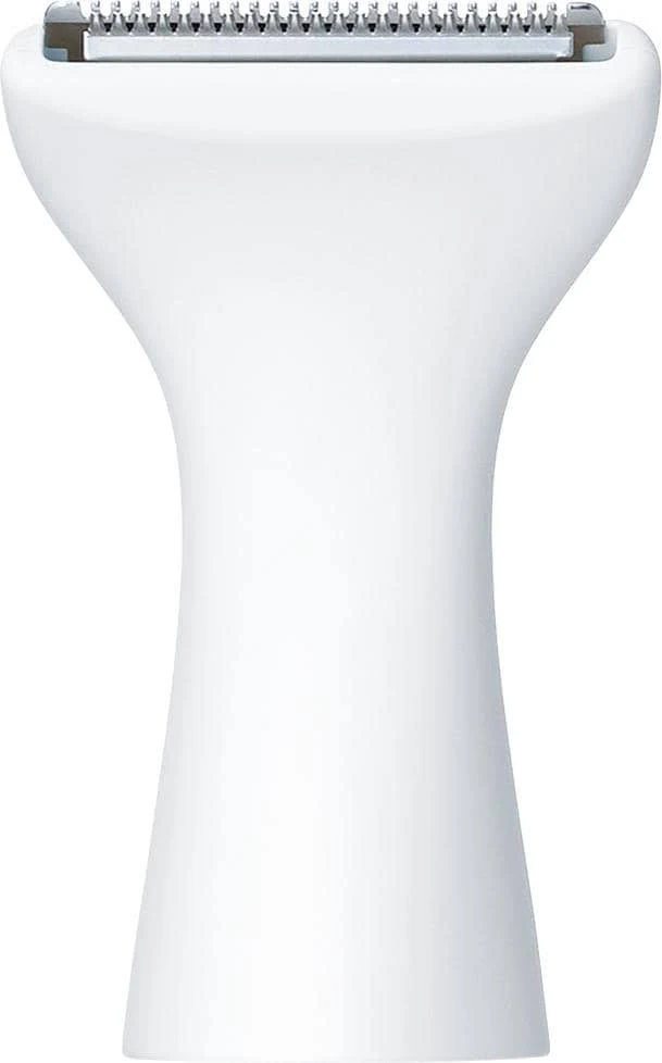 Primer plano de un cabezal de afeitadora eléctrica blanca. Tiene un cuerpo redondeado y una cuchilla plateada y dentada en la parte superior.