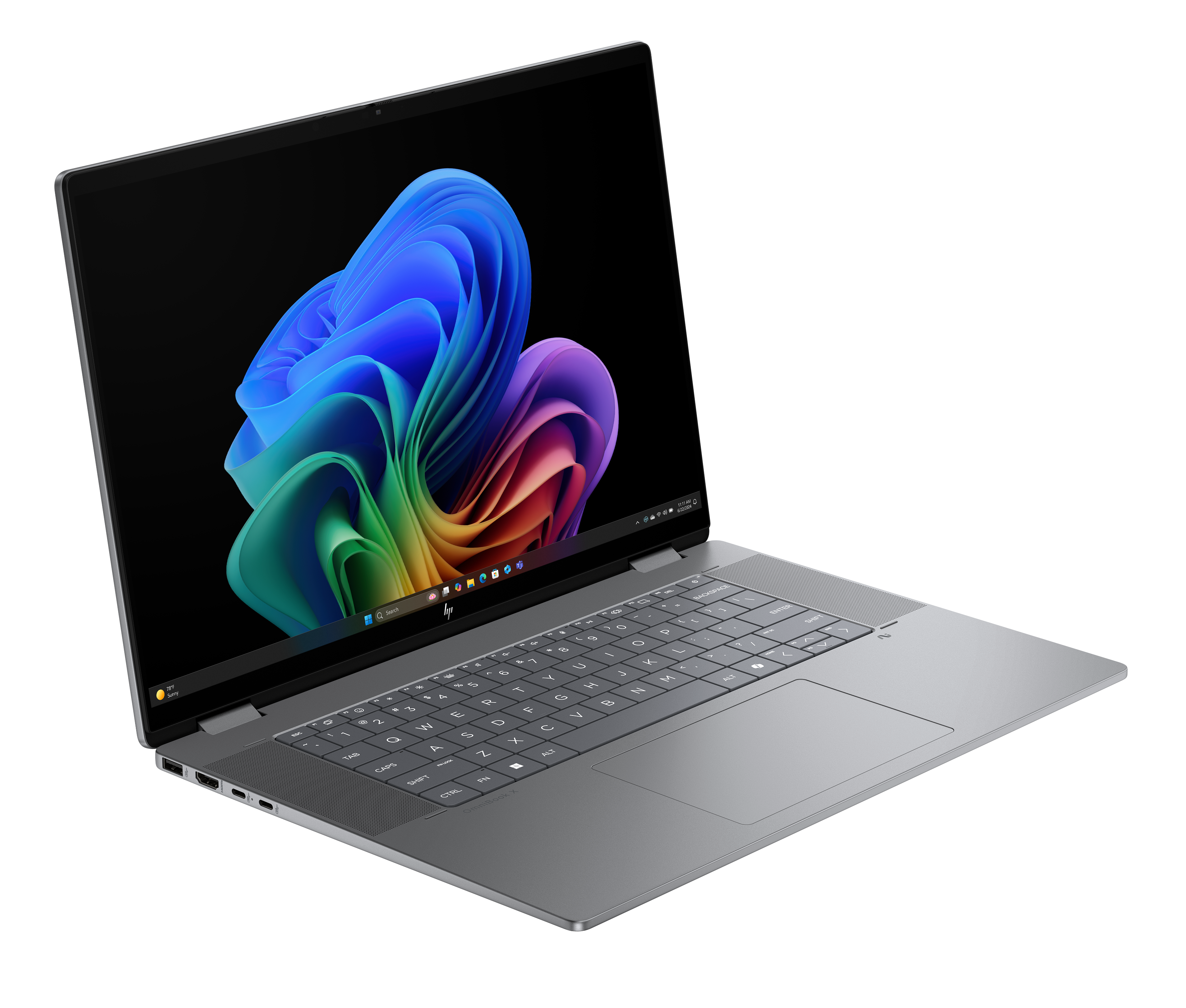 Szary laptop jest otwarty, wyświetlając kolorowy abstrakcyjny obraz. Klawiatura jest widoczna na czarnym tle.