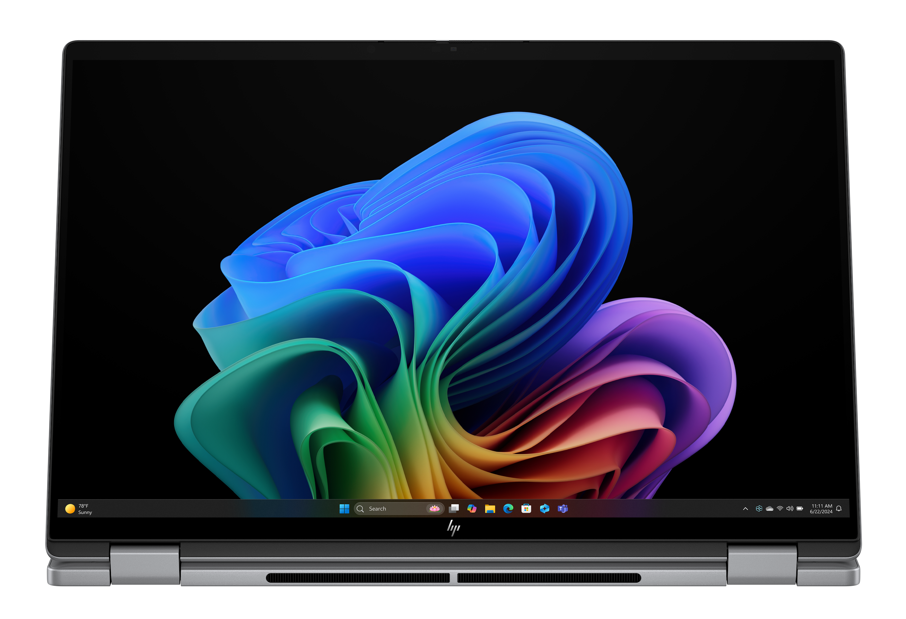 Laptop wyświetlający kolorowy, abstrakcyjny obraz na czarnym tle. Laptop jest otwarty.