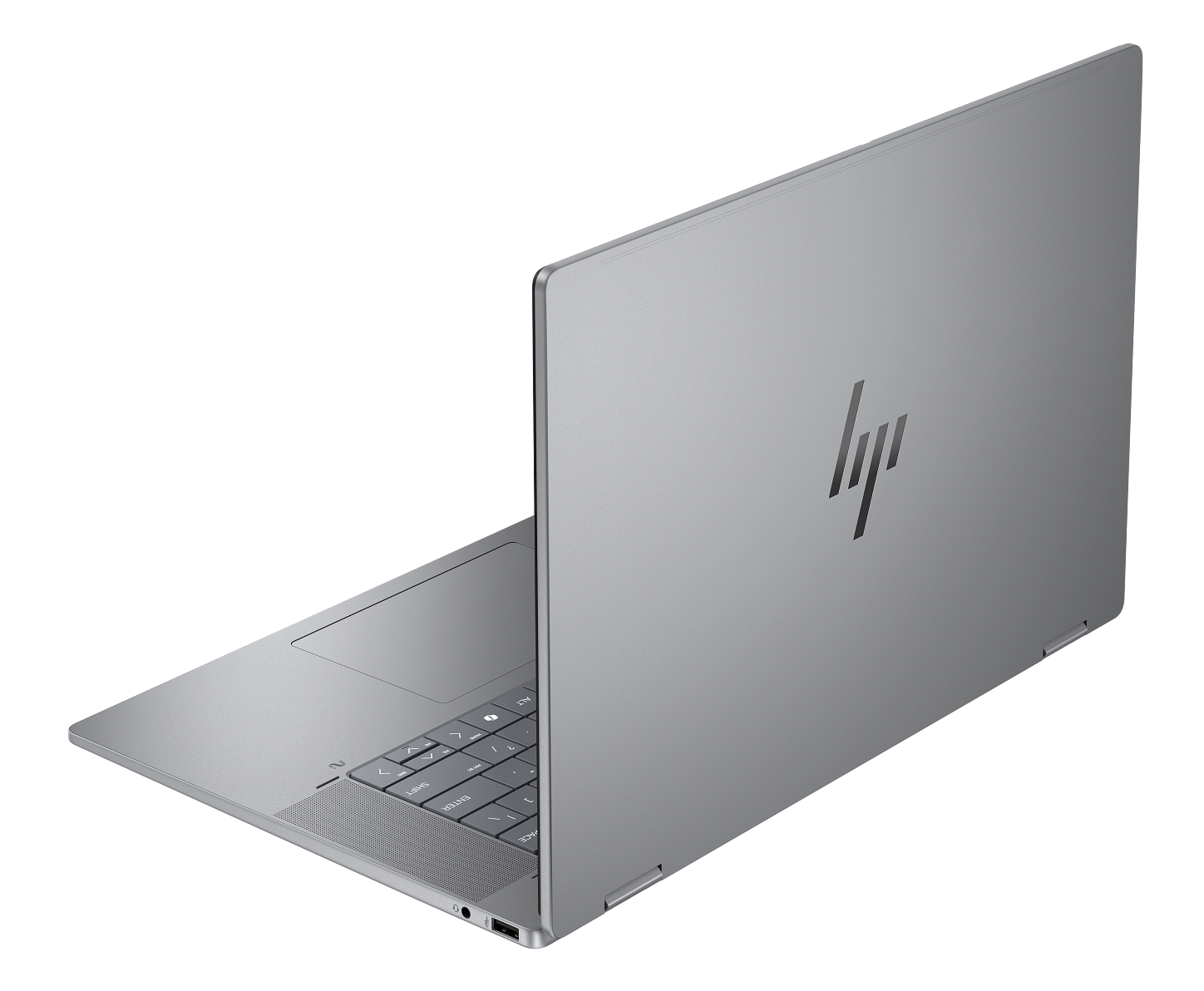Srebrny laptop HP jest otwarty. Ekran jest odchylony do tyłu, pokazując klawiaturę. Logo HP znajduje się z tyłu ekranu.