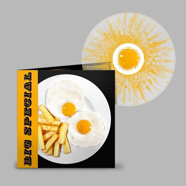 Albumcover: Eier und Pommes auf einem Teller. Schallplatte hat gelbe Spritzer. Albumtitel ist 'BIG SPECIAL'.