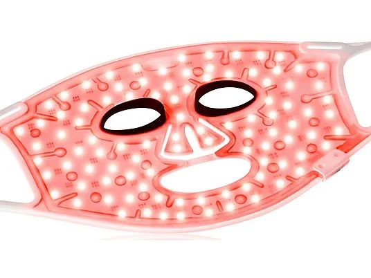 Czerwona maska ​​LED na twarz z otworami na oczy i usta. Ma liczne małe światła i białe paski na uszy.
