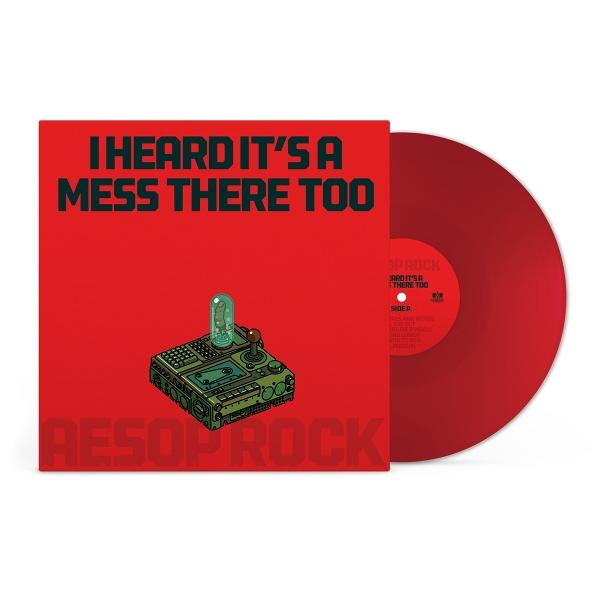 Rote Schallplatte und Albumcover. Das Cover hat eine grüne und schwarze Illustration eines Geräts mit einem Glasbehälter. Text: Ich habe gehört, dass es dort auch ein Chaos gibt.
