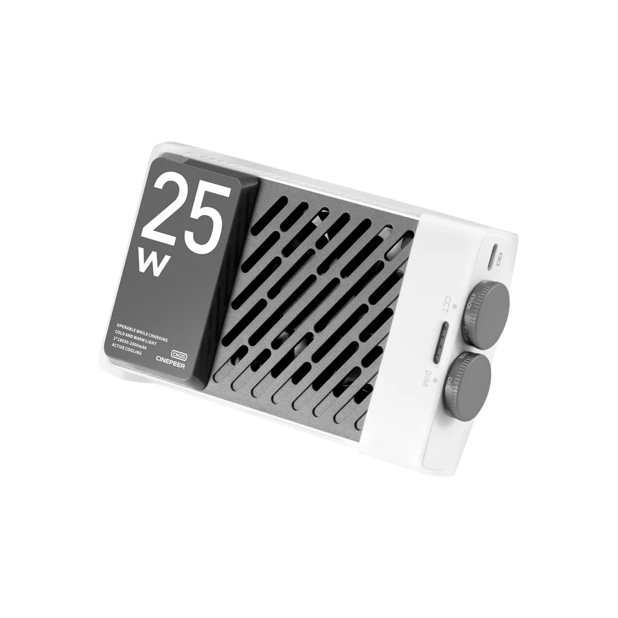 Düğmeleri ve ızgarası olan beyaz ve gri bir cihaz. Üzerinde '25W' yazan siyah bir panel var.