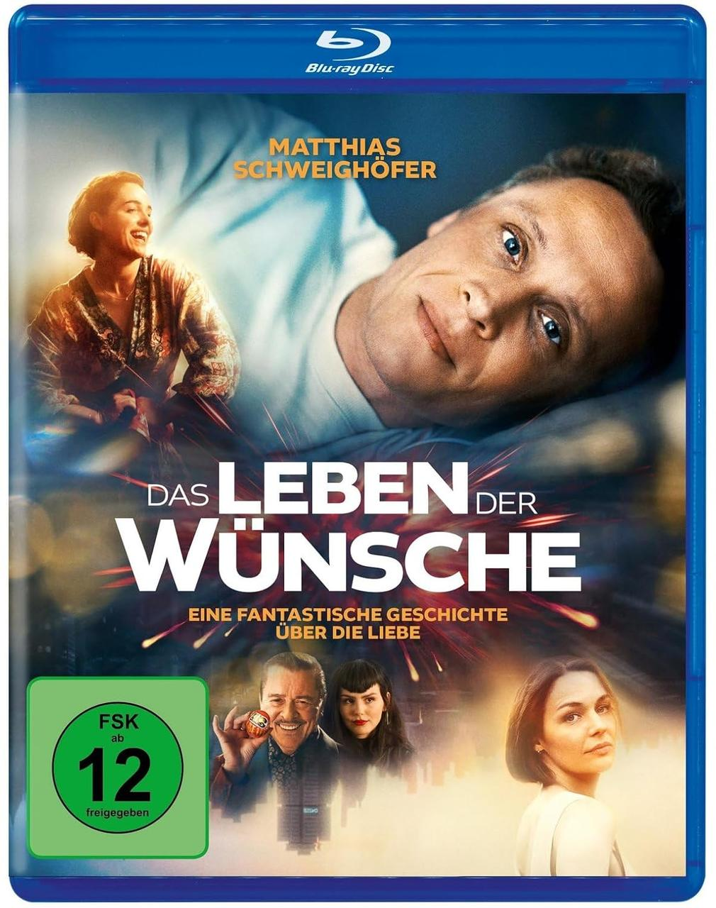 Blu-ray-Cover mit Matthias Schweighöfer. Titel: Das Leben der Wünsche. Andere Schauspieler abgebildet. FSK 12-Rating.