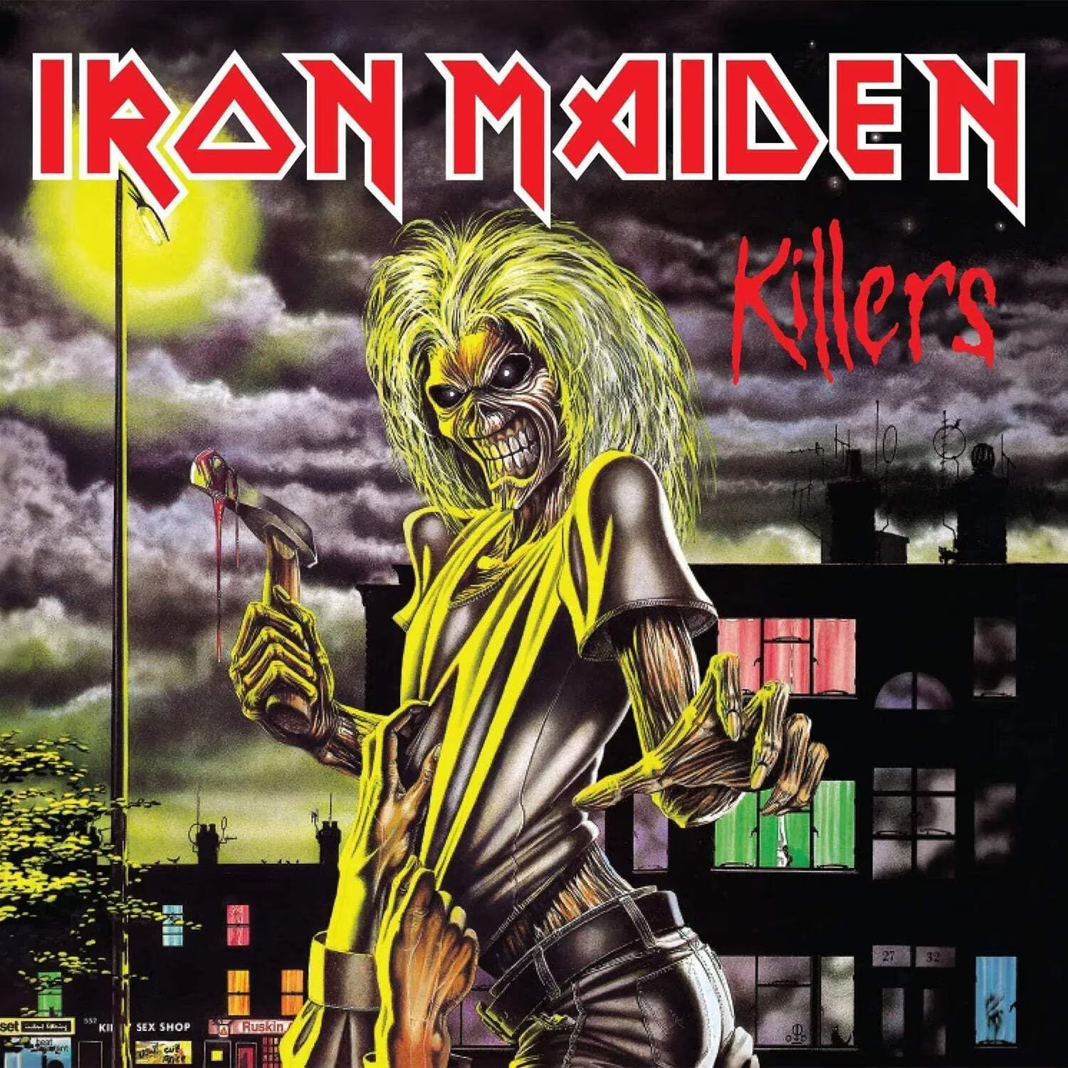 Copertina dell'album: Zombi che tiene un martello insanguinato. Sfondo della città. Titolo: Iron Maiden Killers.