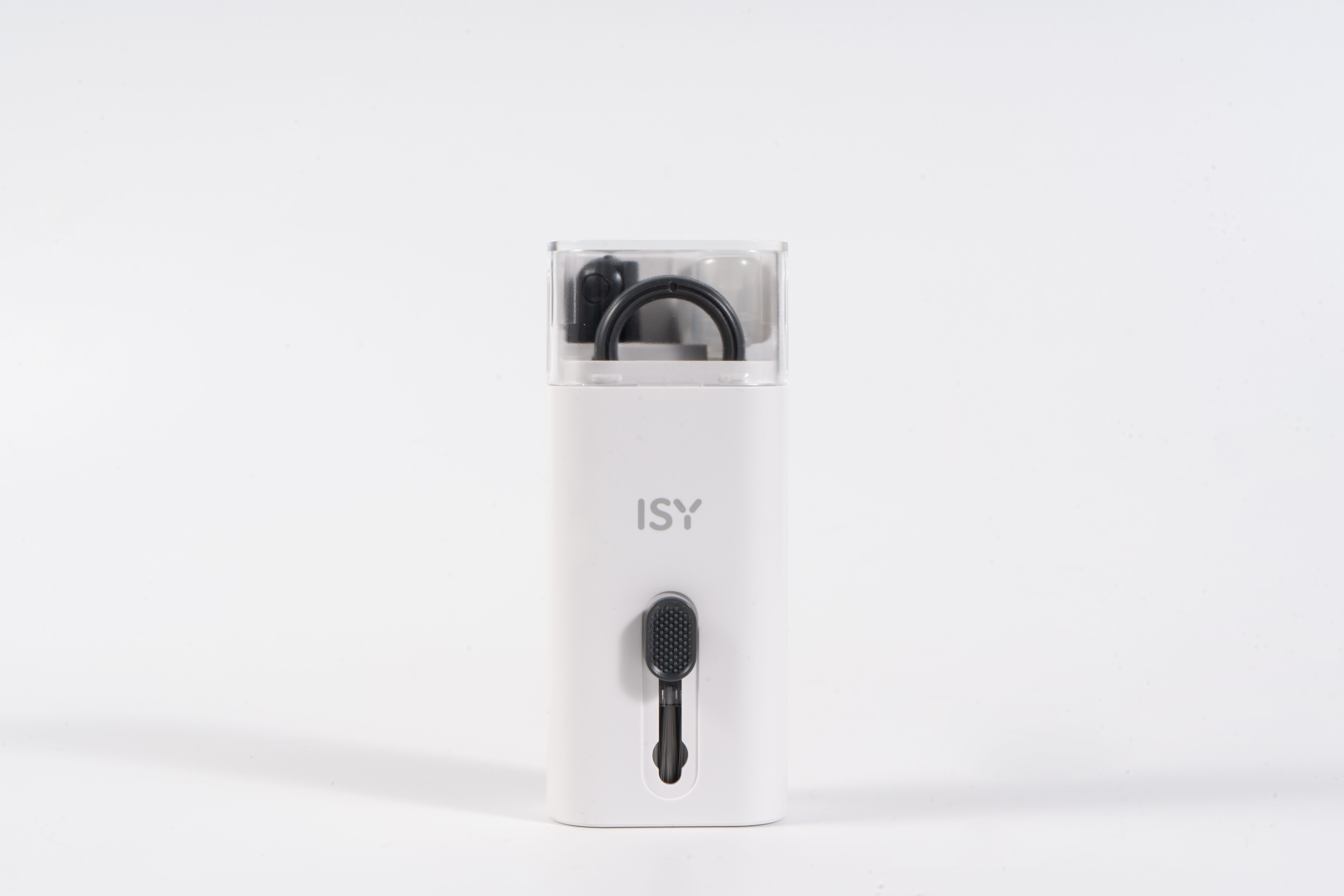 Białe etui ISY z czarnymi akcesoriami w środku. Z przodu czarny uchwyt.