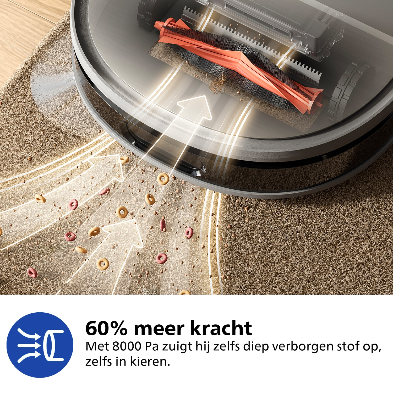 Een robotstofzuiger maakt een tapijt schoon. Hij heeft een oranje borstel en zuigt etensresten op. Pijlen geven de zuigkracht aan.