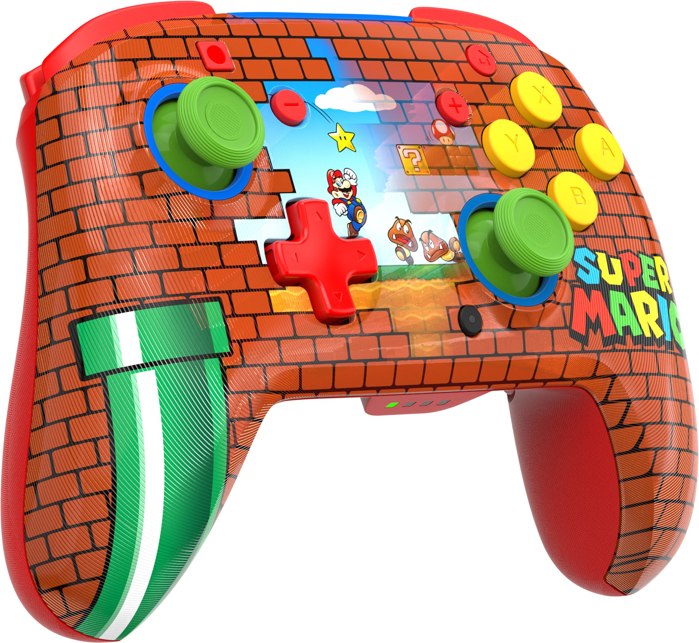 Kontroler w stylu Super Mario. Czerwony i pomarańczowy wzór ceglany. Scena z Mario pośrodku. Zielone joysticki i żółte przyciski.