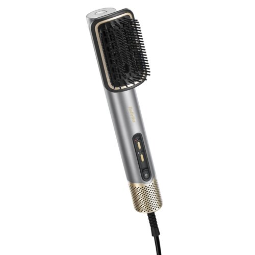 Srebrno-złota szczotka do prostowania włosów z czarnym włosiem i czarnym przewodem zasilającym, lekko pochylona w prawo.