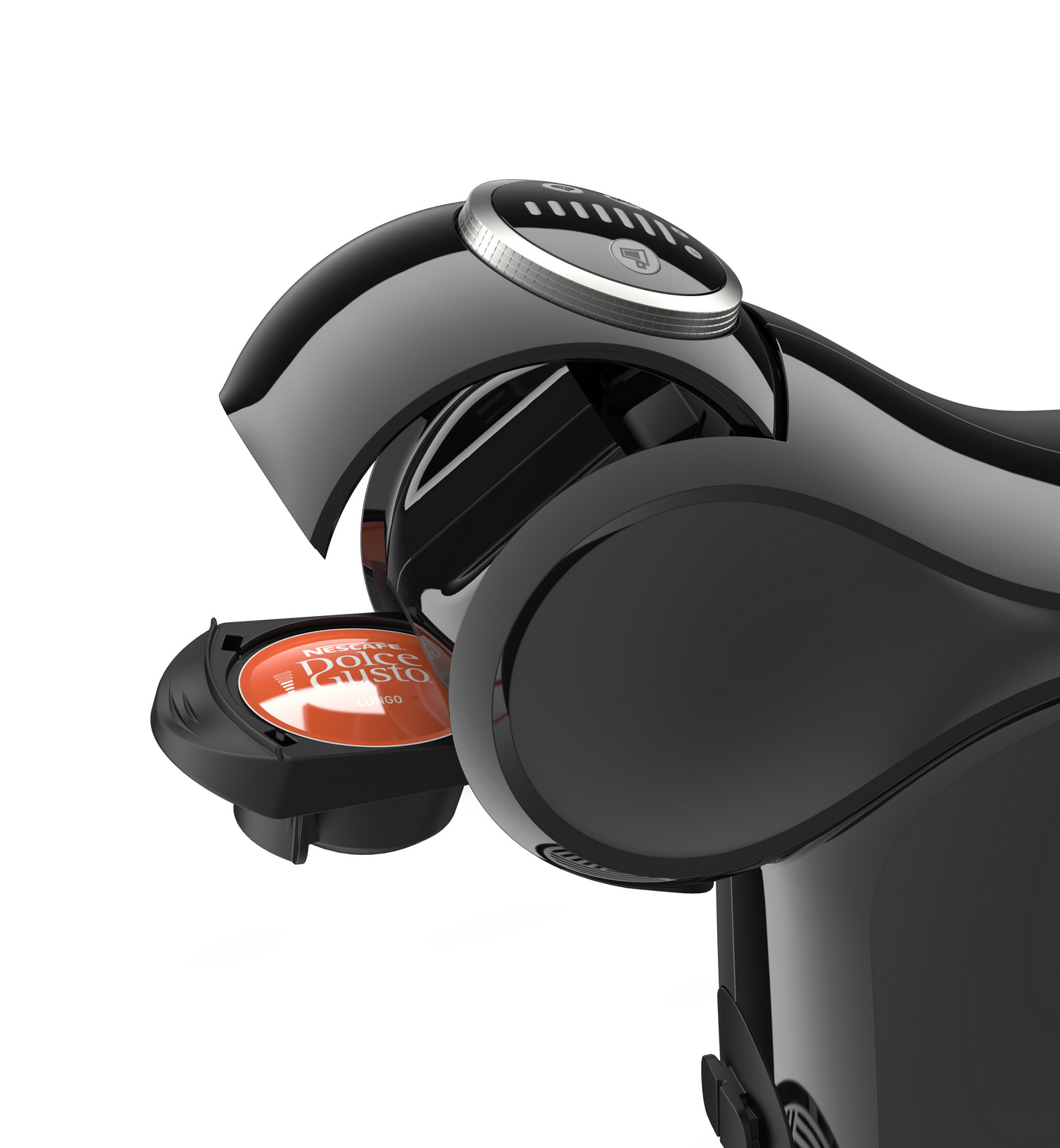 Una cafetera Dolce Gusto negra con una cápsula de café naranja. La máquina es brillante y tiene un botón plateado en la parte superior.