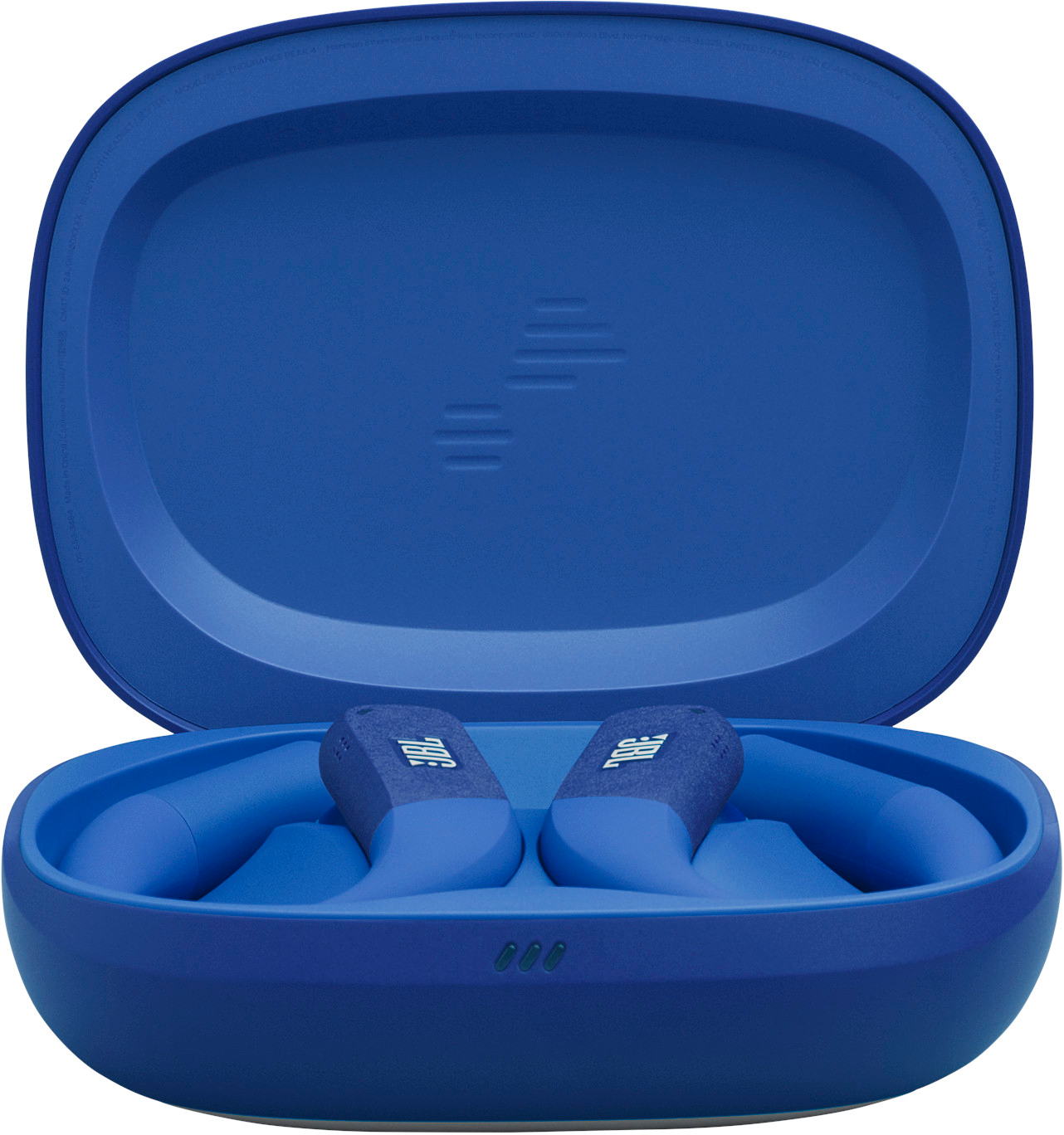 Écouteurs JBL bleus dans un étui ouvert. L'étui et les écouteurs sont bleus. Le logo JBL est visible sur les écouteurs. L'arrière-plan est flou.