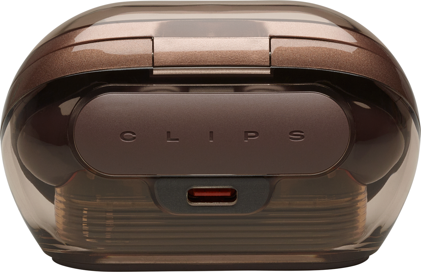 Una custodia marrone a forma ovale con la scritta "CLIPS". Ha una porta di ricarica e un fondo trasparente.