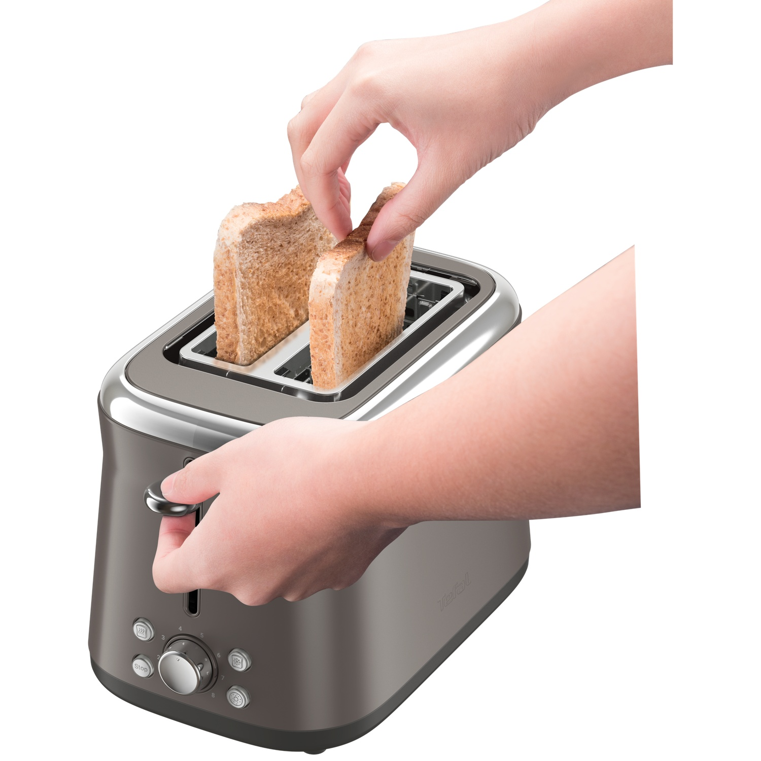 Hands placing toast slices into a gray toaster. The toaster is on a white background.