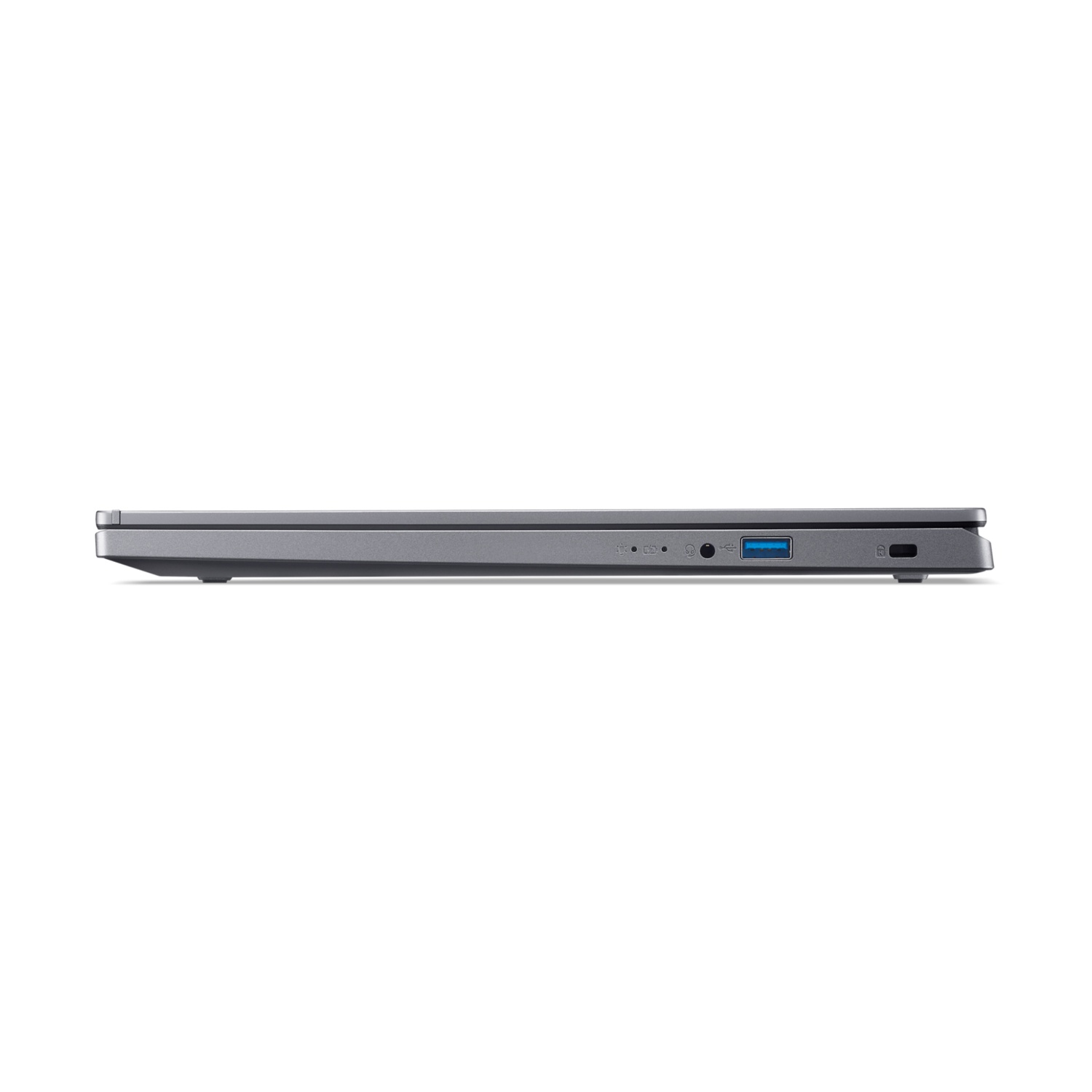 Vista laterale di un laptop grigio chiuso. Le porte visibili includono USB, audio e alimentazione. Lo sfondo è bianco.