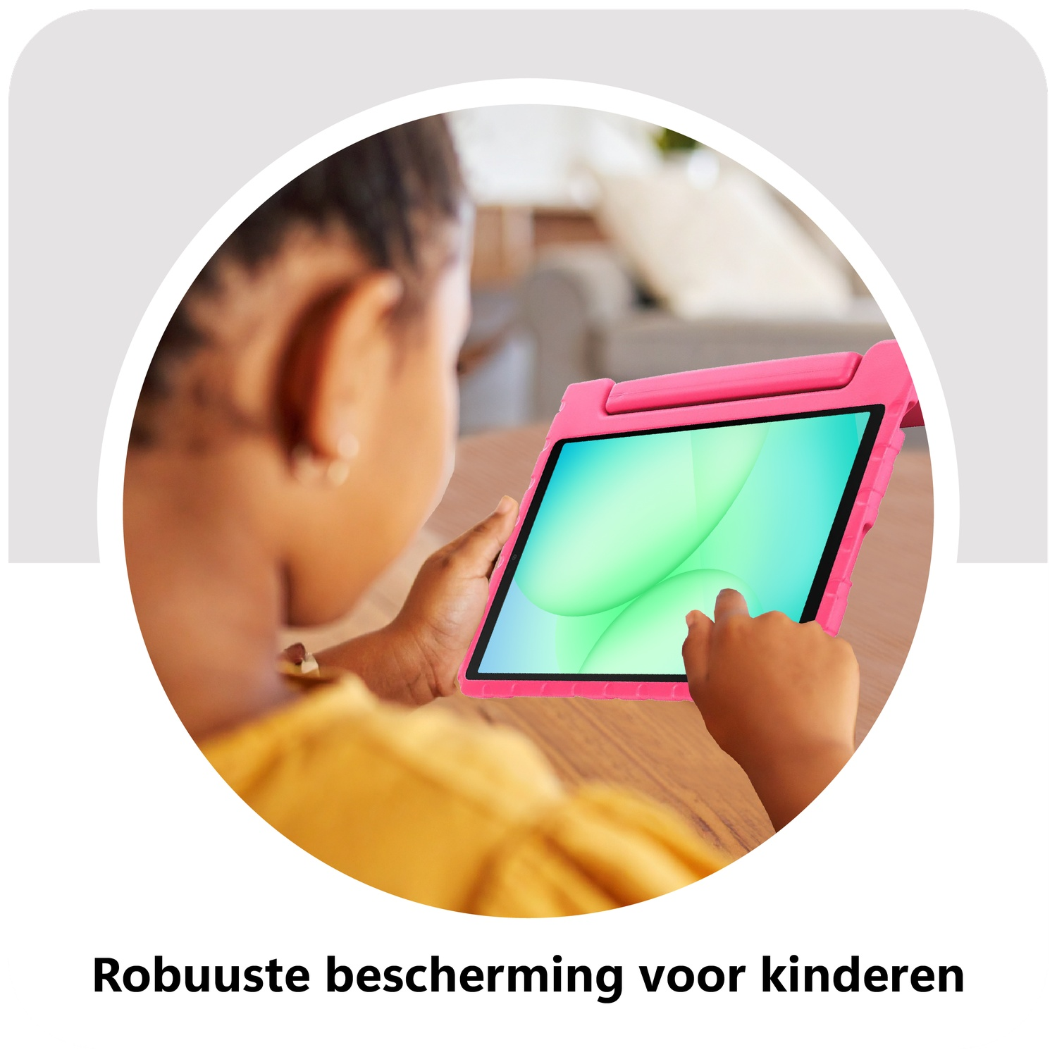 A child is using a tablet in a pink case. The screen displays a green and white design.