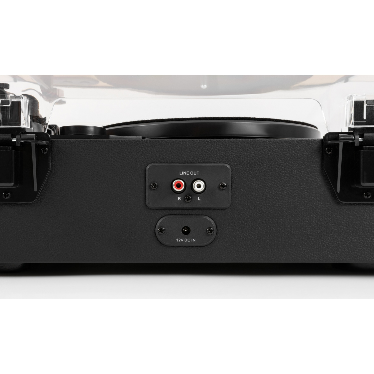 Close-up of a black record player with a clear plastic cover. Features 'LINE OUT' and '12V DC IN' ports. A turntable is visible.