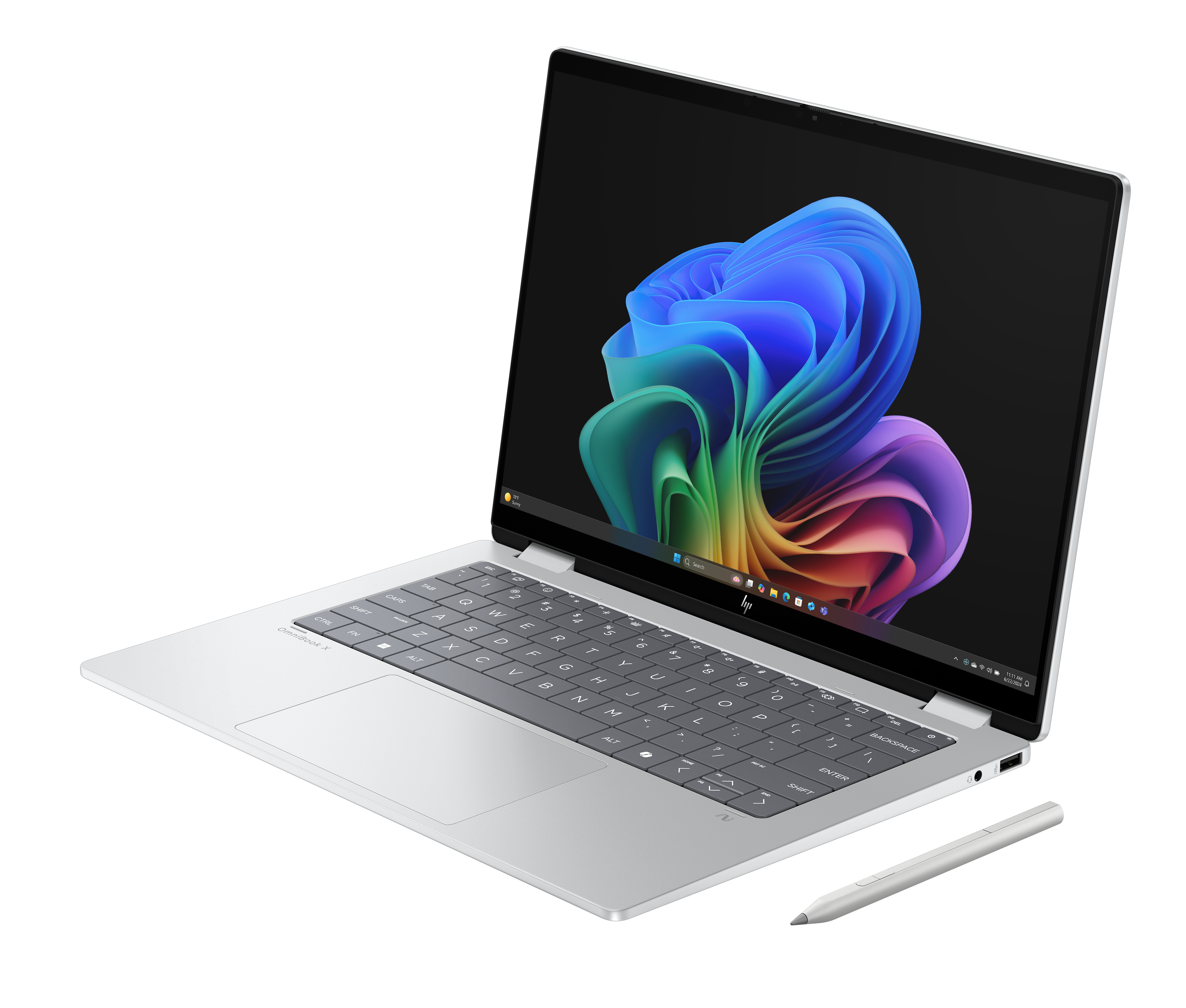 Srebrny laptop z otwartym ekranem, pokazujący kolorowy wzór wiru, rysik z boku, czarne tło.