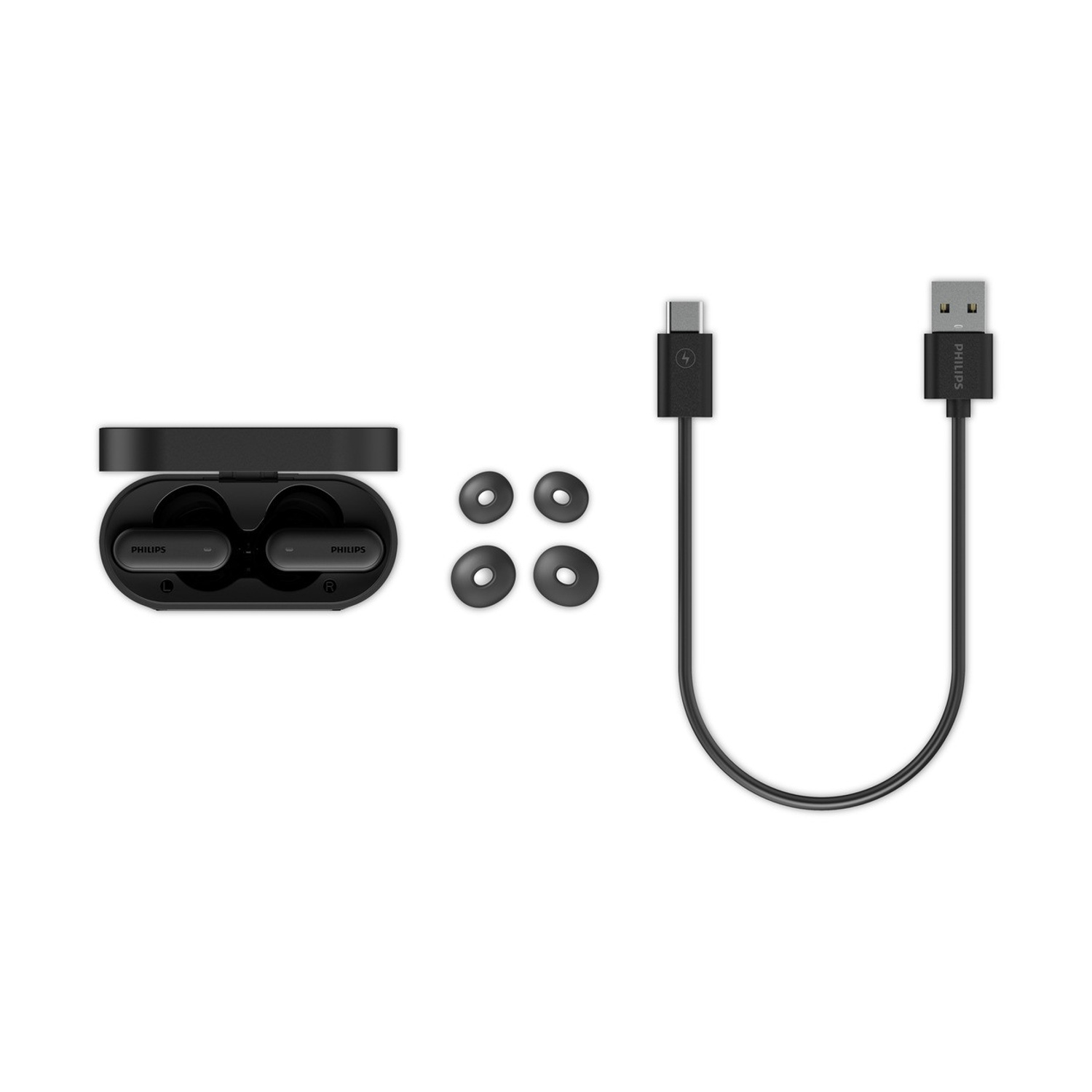 Auricolari Philips neri con custodia, gommini extra e cavo di ricarica USB-C su una superficie bianca.