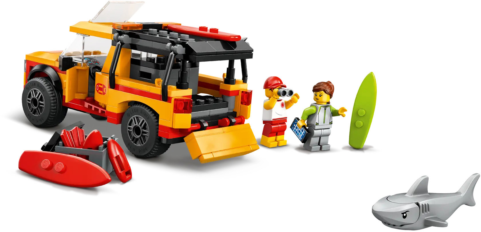 Zestaw Lego: Żółta ciężarówka ratownicza, figurki, deska surfingowa, rekin. Figurki z lornetką, tabletem i deską, gotowe do ratowania.