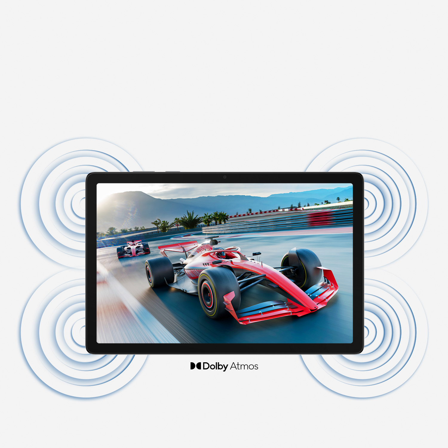 Tableta muestra un coche de carreras en una pista. Círculos de ondas de sonido azules rodean la tableta. Logotipo Dolby Atmos visible.