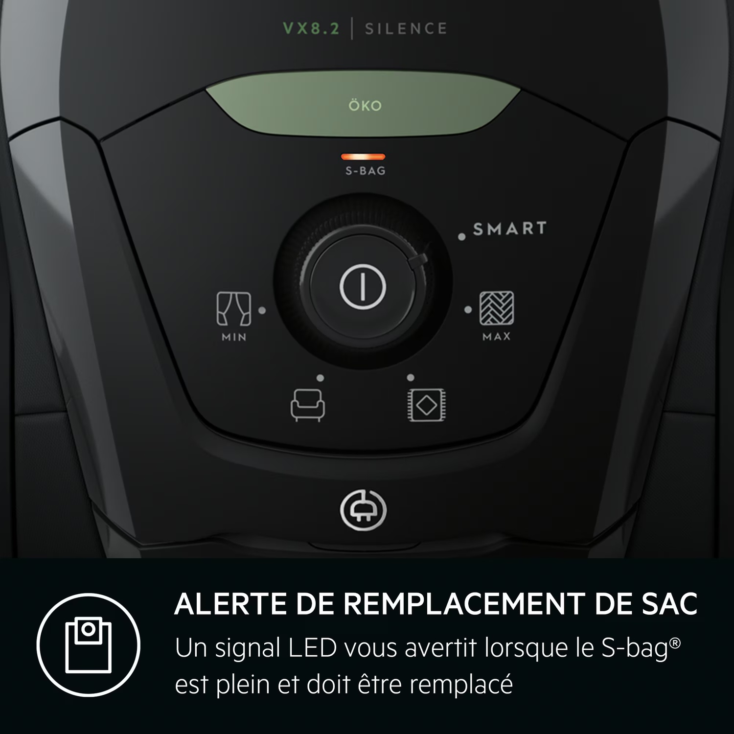 Gros plan du panneau de commande d'un aspirateur. Il comporte des boutons et un cadran, avec du texte en français pour l'alerte de remplacement du sac.