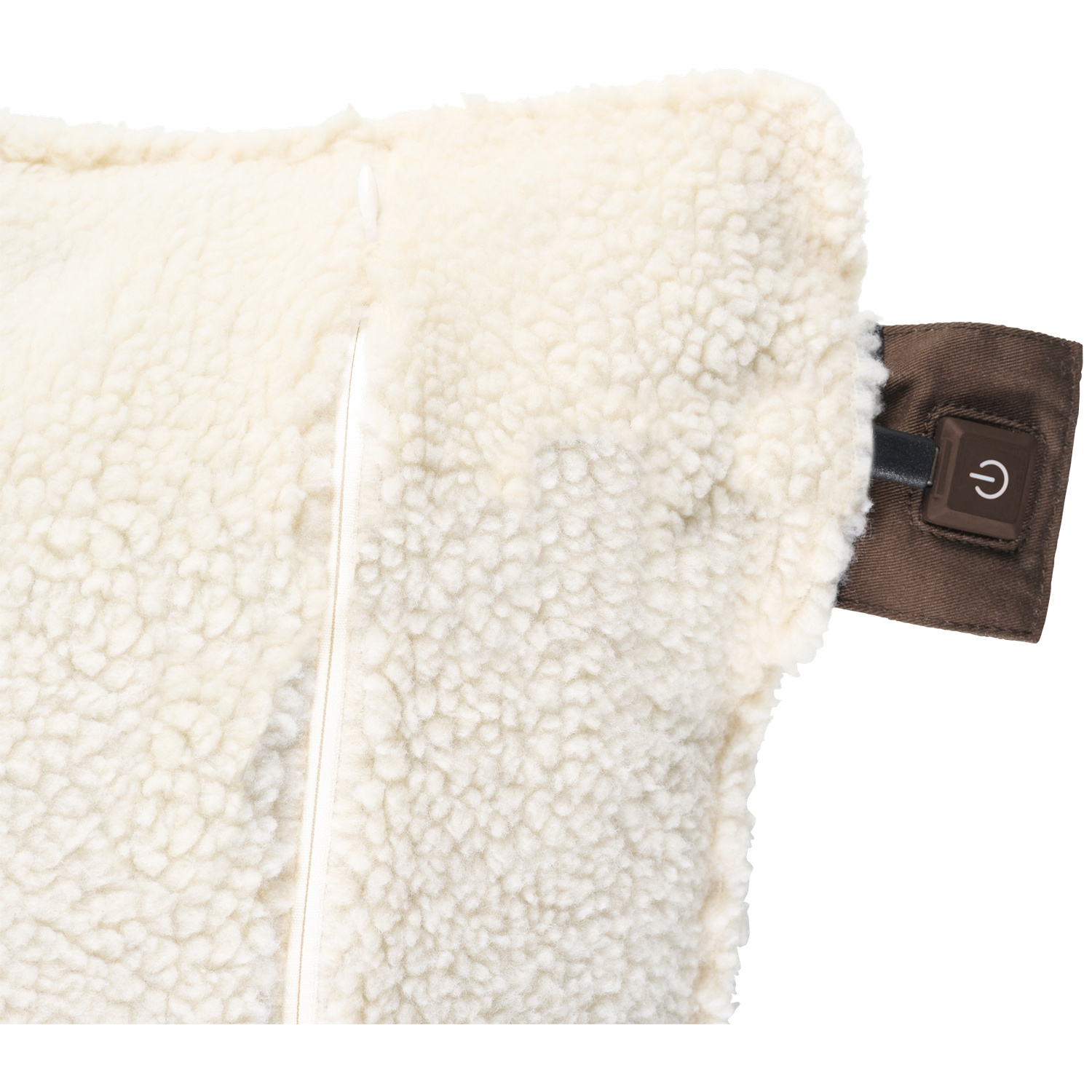 Gros plan d'un tissu blanc, moelleux et texturé avec une fermeture éclair. Un patch en tissu marron avec un bouton d'alimentation est sur le côté.