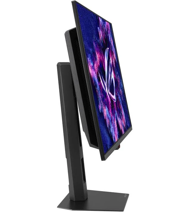 Un monitor de computadora negro, en ángulo, muestra una imagen abstracta colorida. El monitor está soportado por un soporte negro sobre una base gris.