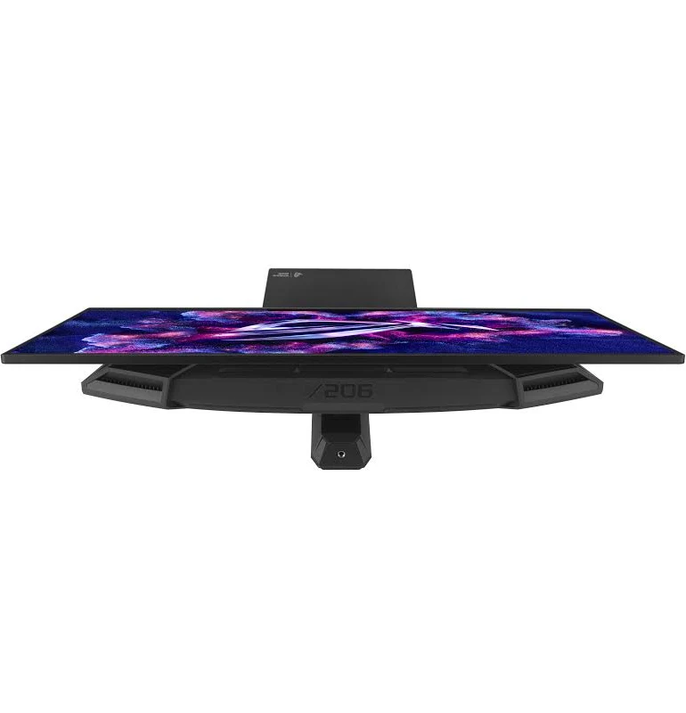 Un monitor de computadora negro, inclinado ligeramente hacia arriba, que muestra una imagen abstracta y colorida. Tiene un soporte y un logotipo visible.