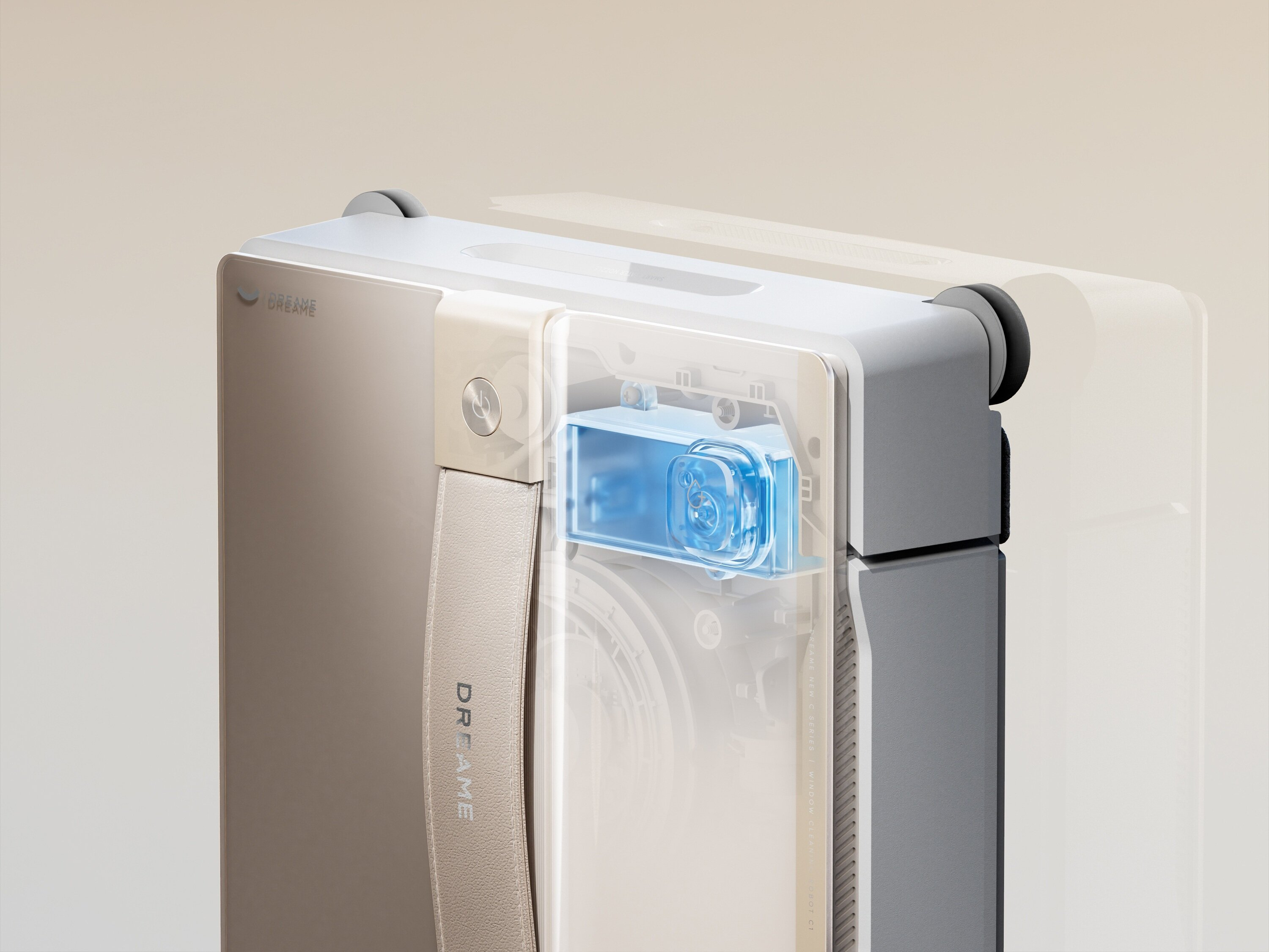 Zbliżenie urządzenia marki Dream, pokazujące beżowy uchwyt, przezroczysty niebieski element i szary korpus.