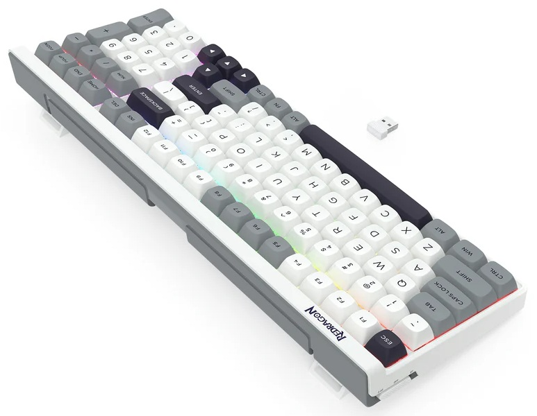Biała i szara klawiatura mechaniczna z klawiszami w różnych kolorach, odbiornik USB. Widoczne logo Redragon.