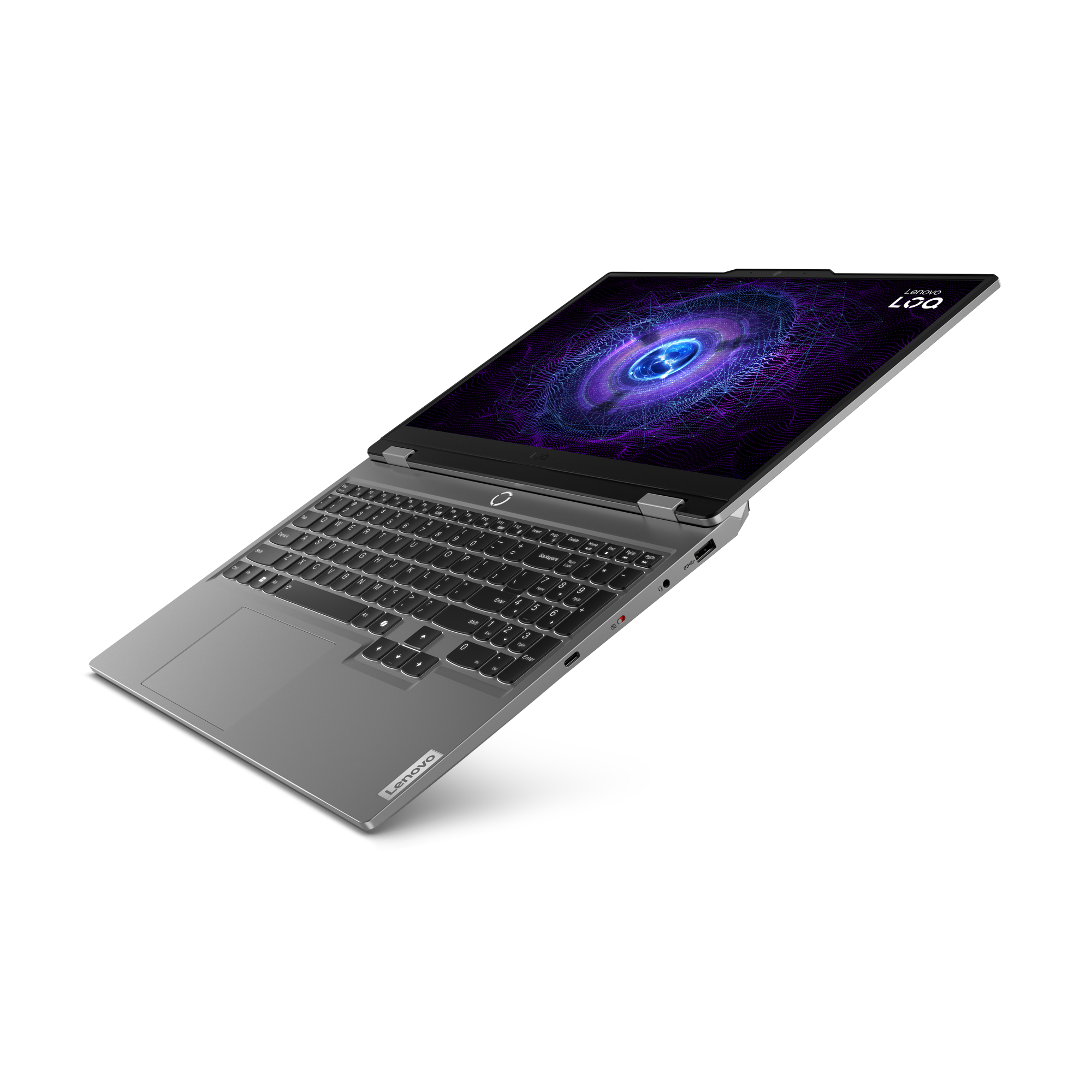 Açık Lenovo dizüstü bilgisayar. Ekran mor ve mavi bir tasarım gösteriyor. Klavye görünür. Gri kasa. Beyaz arka plan.