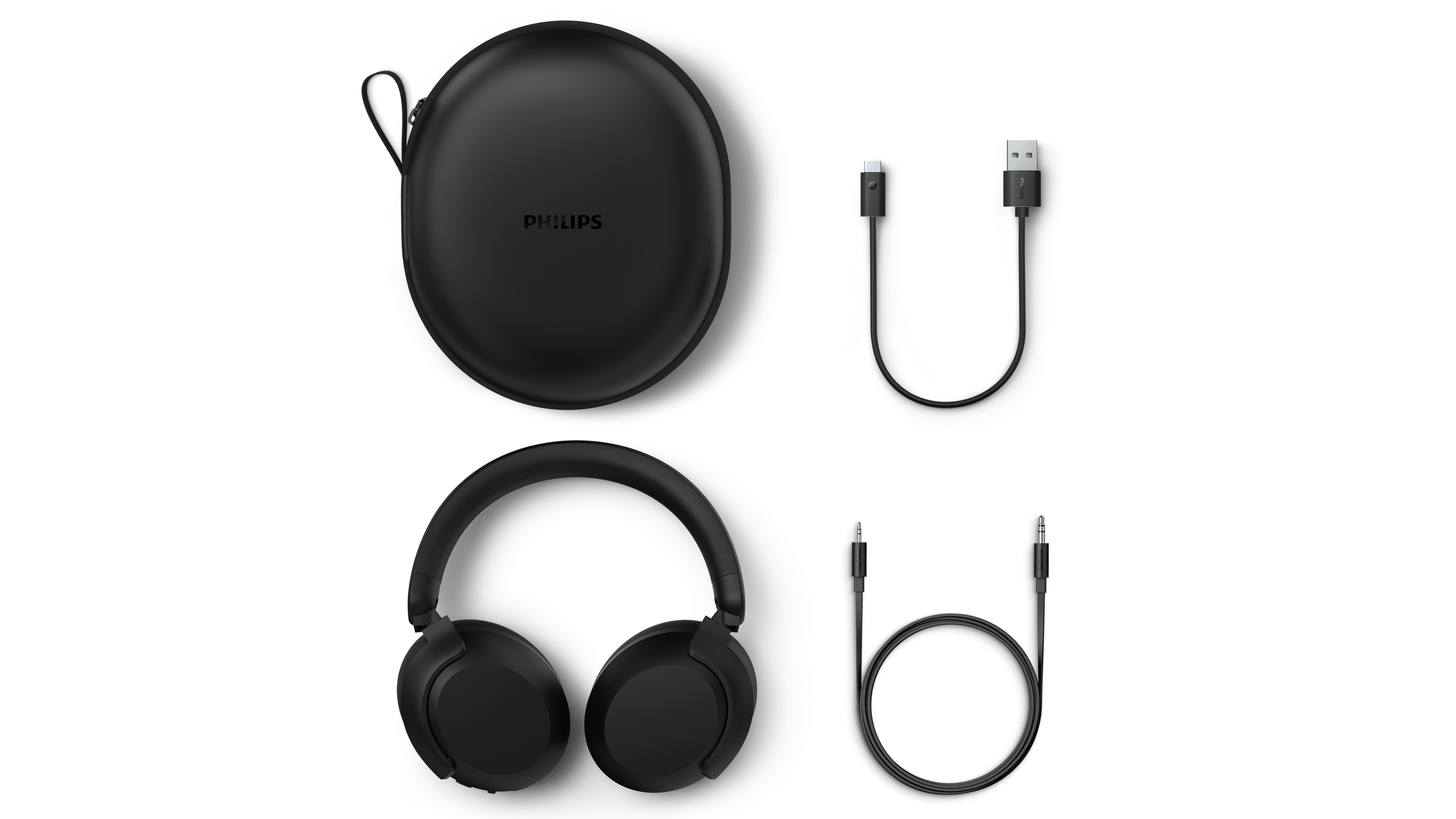 Schwarze Philips-Kopfhörer, -Etui und -Kabel auf weißem Hintergrund. Enthält USB-C-, USB- und Audiokabel.