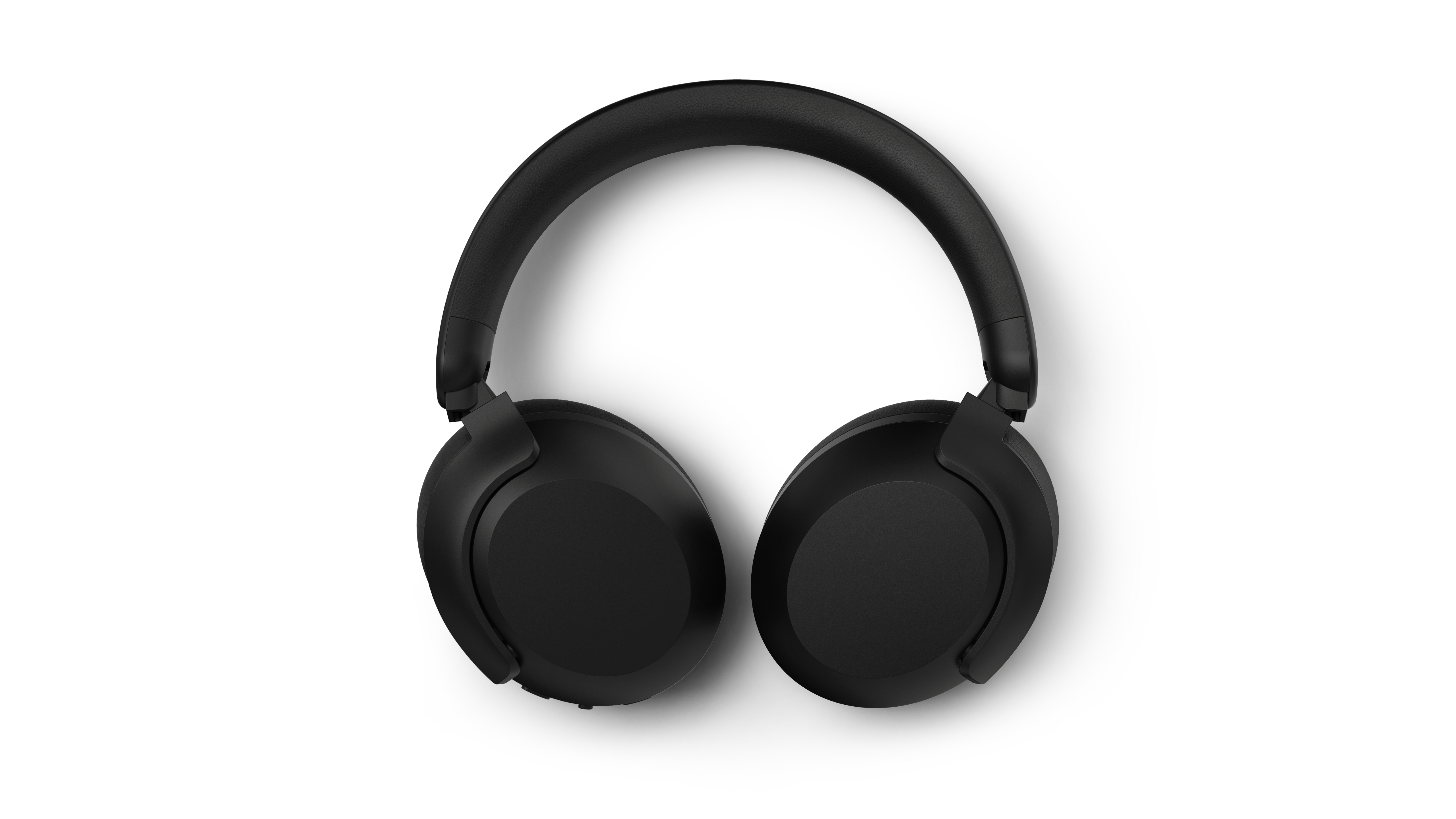 Schwarze Over-Ear-Kopfhörer auf weißem Hintergrund. Die Kopfhörer sind der Hauptfokus, mit ihren Ohrmuscheln und dem Bügel sichtbar.