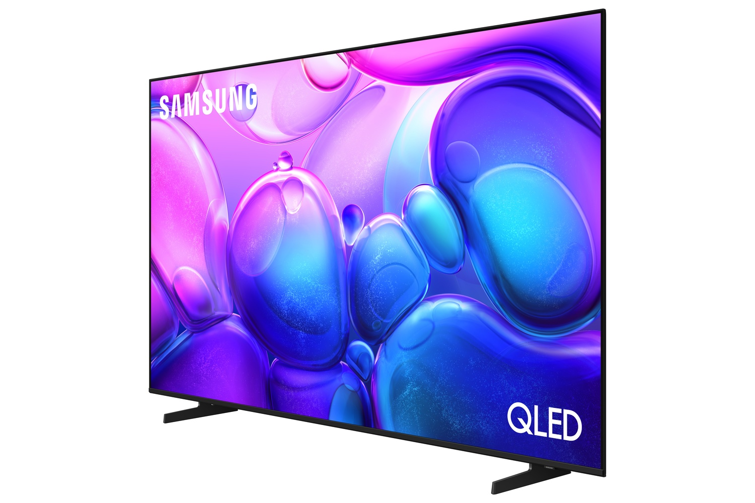 Un televisor Samsung QLED muestra una imagen abstracta colorida. El televisor es negro y se apoya en dos patas negras. El logotipo de Samsung es visible.