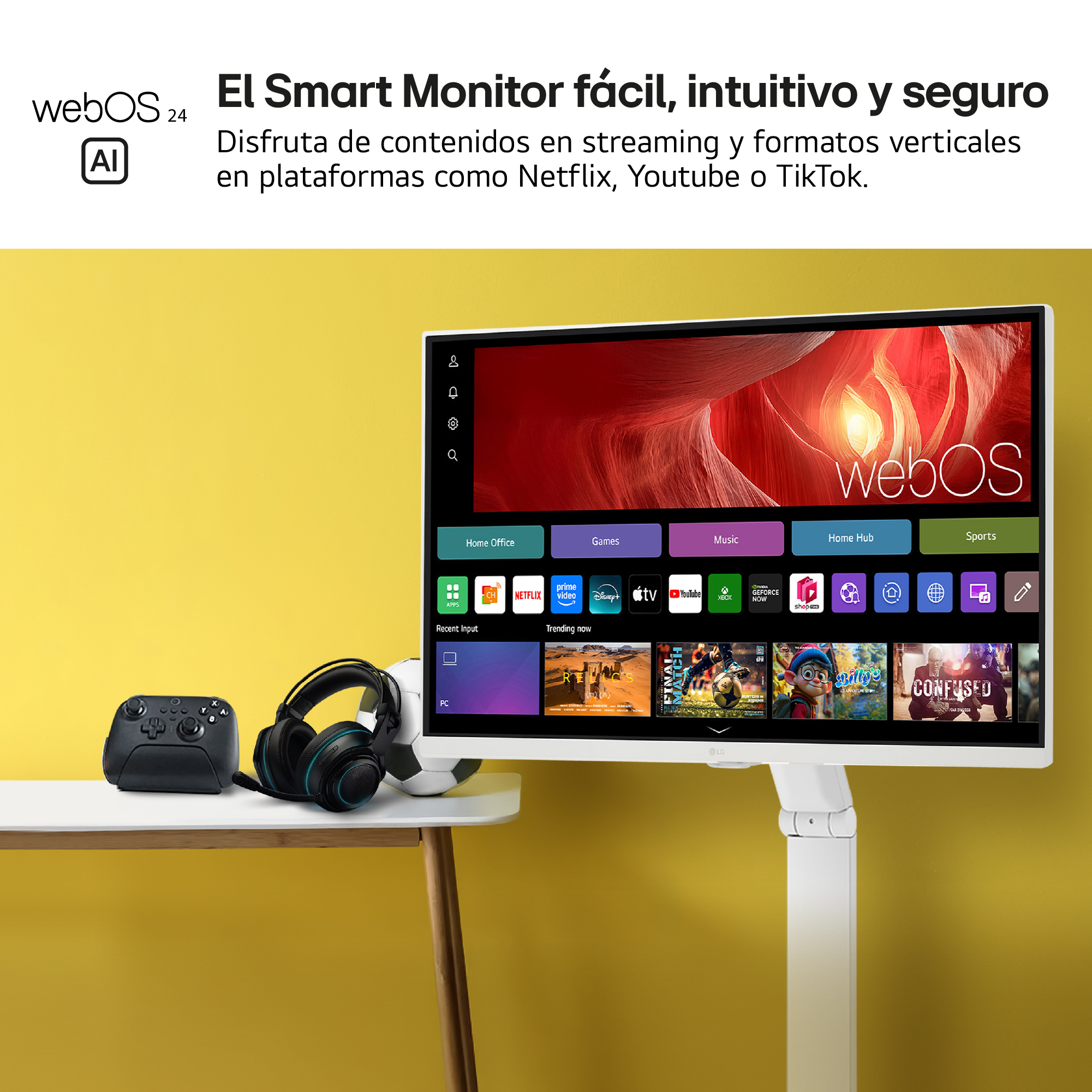 Un monitor inteligente con webOS, mostrando aplicaciones y contenido. Un gamepad, auriculares y un balón de fútbol en primer plano.