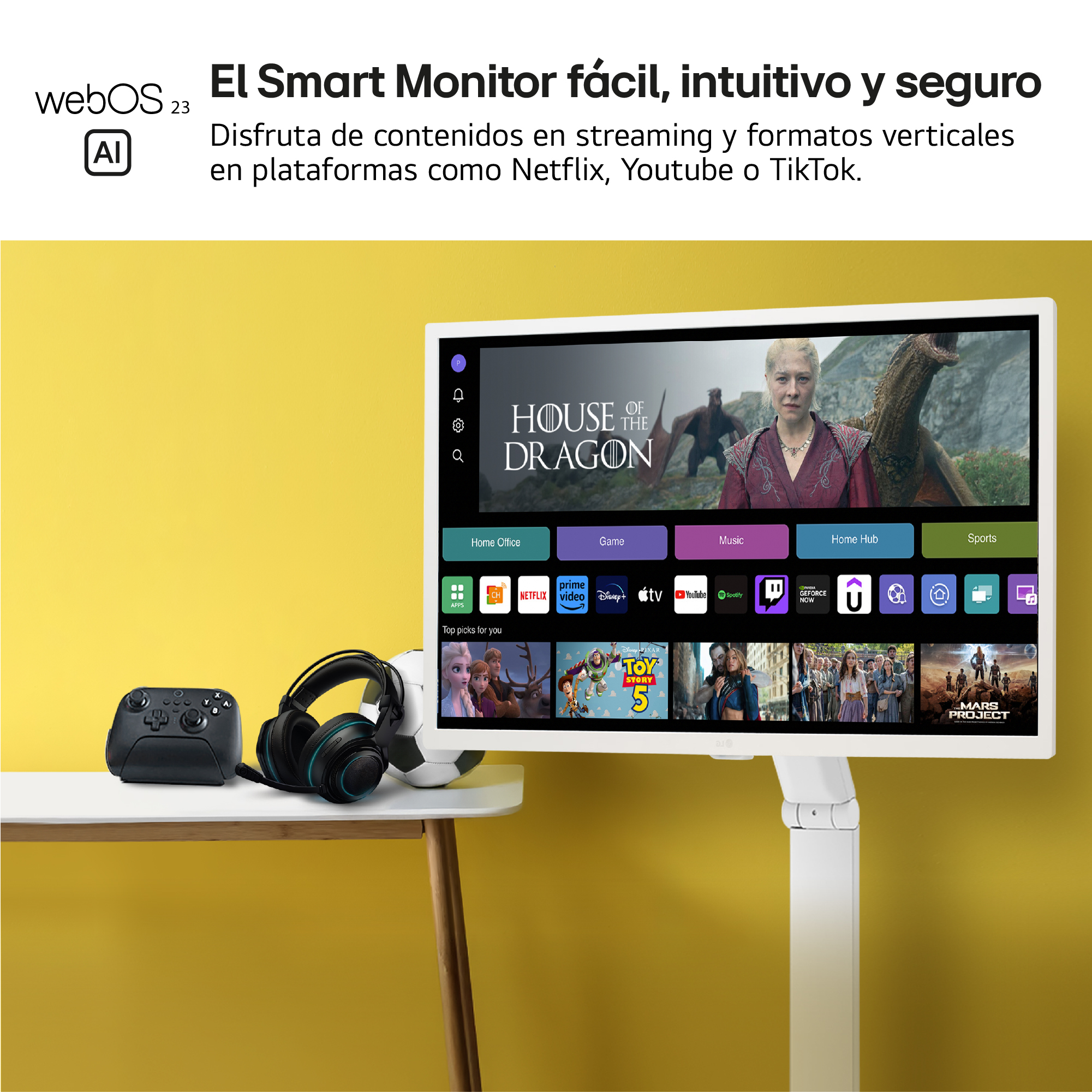 Monitor inteligente mostrando 'House of the Dragon'. Un controlador, auriculares y un balón de fútbol.